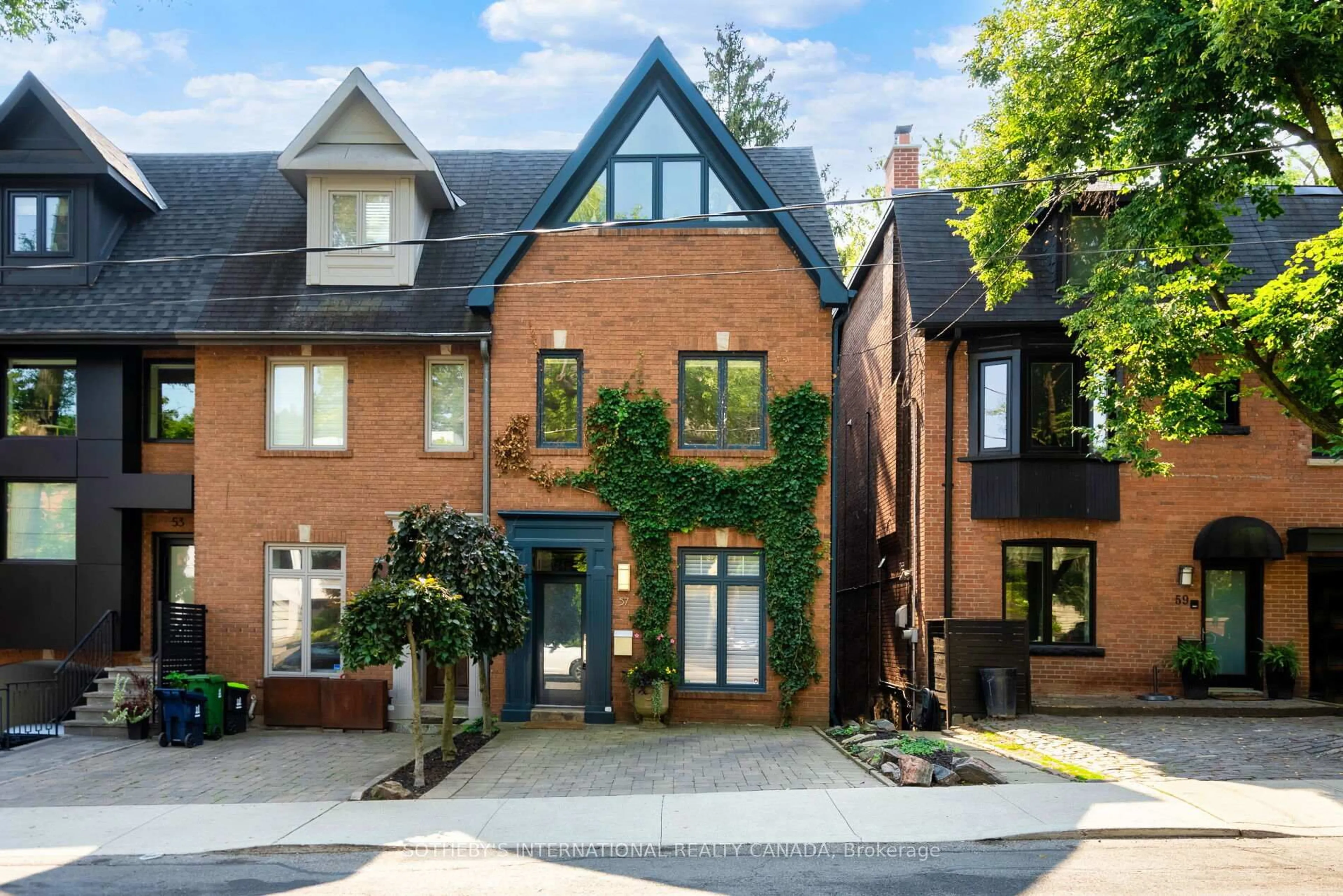 Home with brick exterior material, street for 57 Woodlawn Ave, Toronto Ontario M4V 1G6
