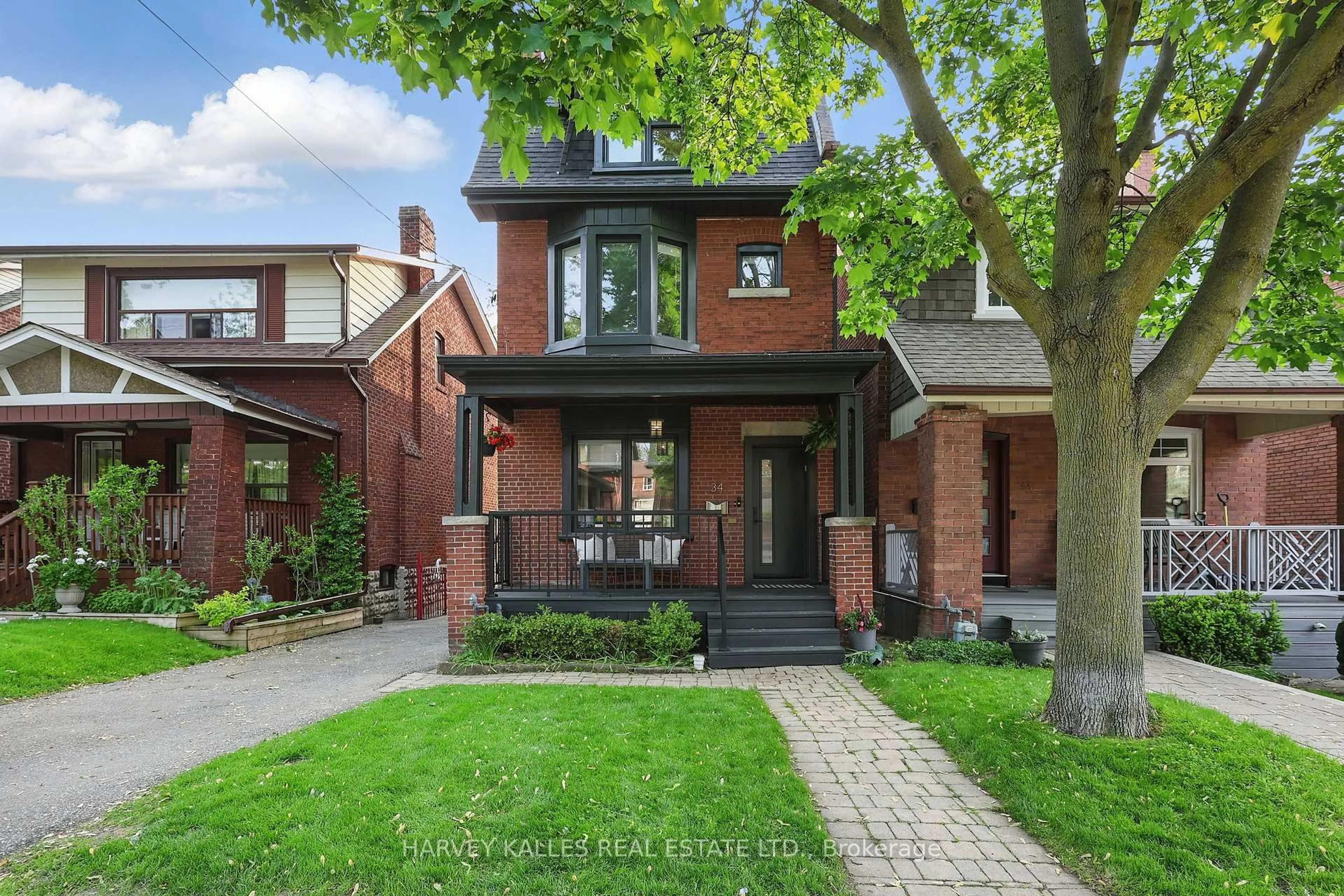 Home with brick exterior material, street for 34 Winnett Ave, Toronto Ontario M6C 3L3