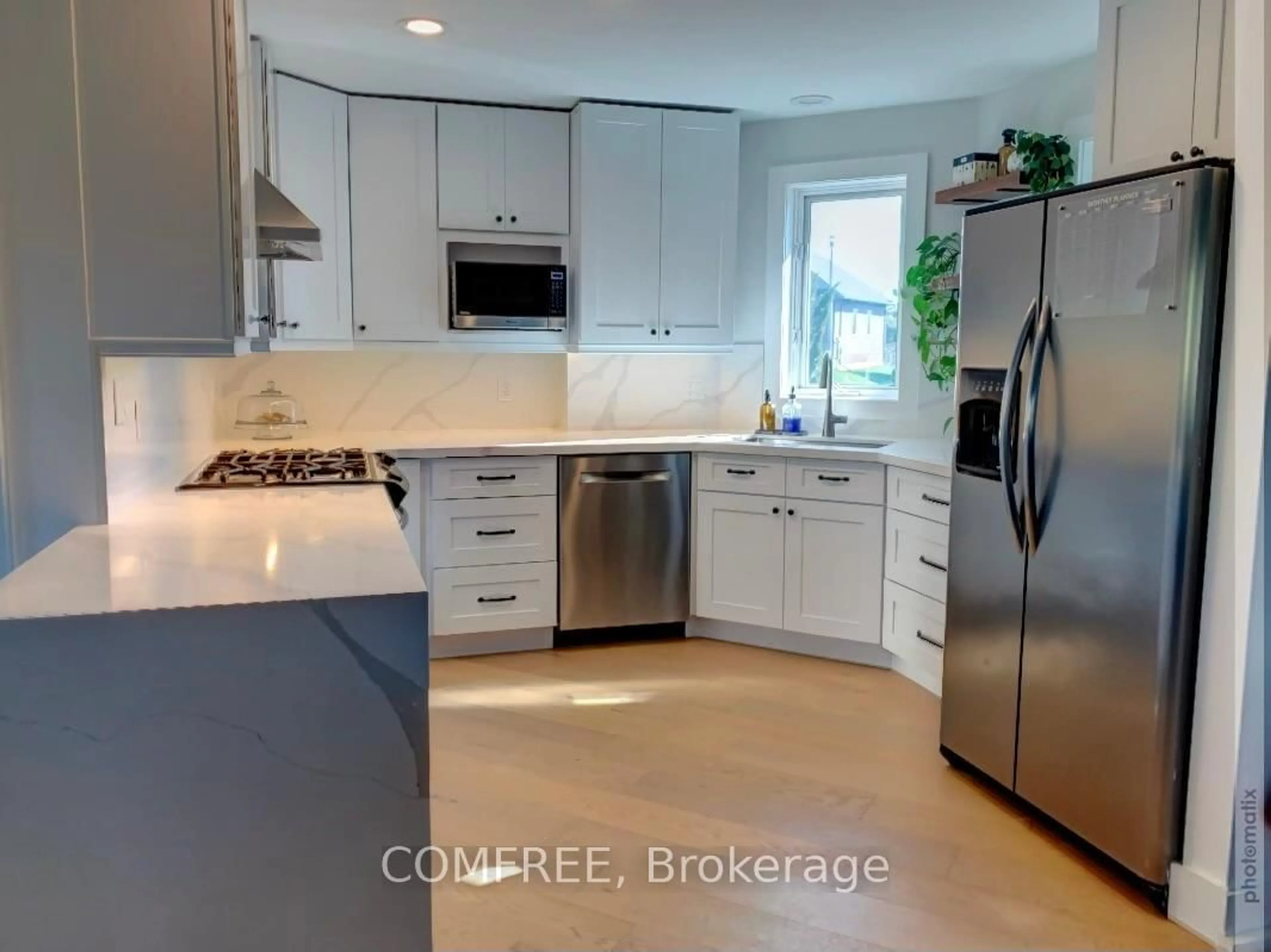 Open concept kitchen, ceramic/tile floor for 30 Bridle Path, Oro-Medonte Ontario L0L 2L0