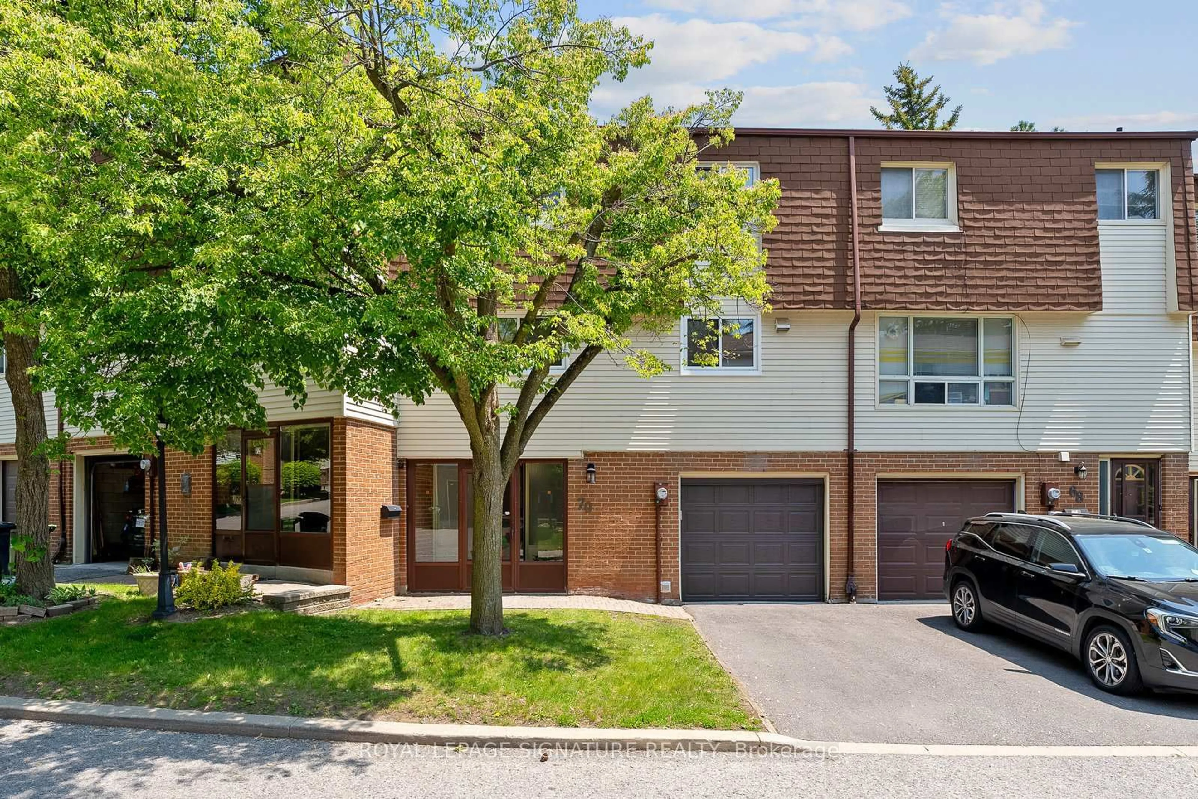 Home with brick exterior material, street for 70 Jenny Wrenway, Toronto Ontario M2H 2Y9