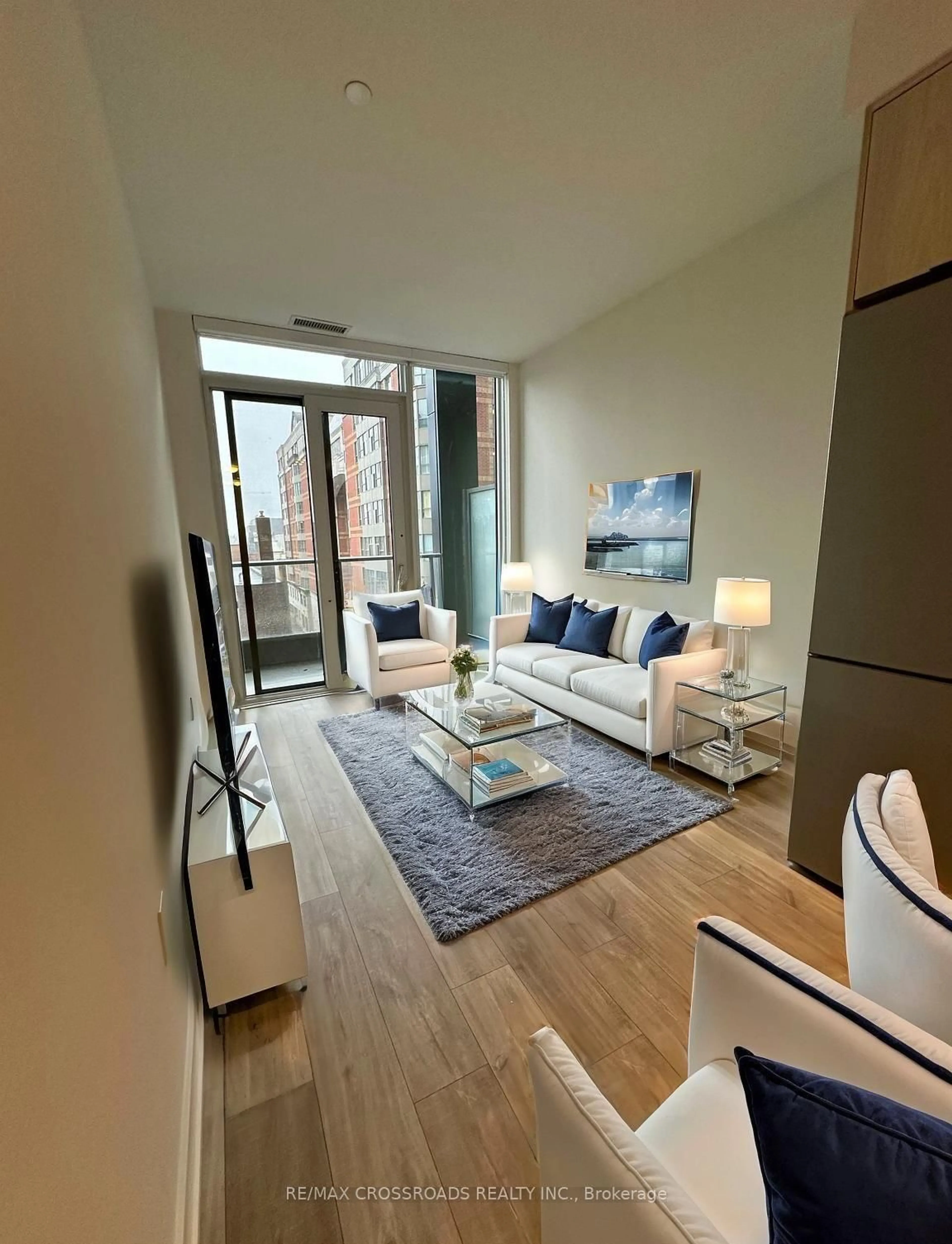 Living room with furniture, unknown for 70 Princess St #406, Toronto Ontario M5A 0X6