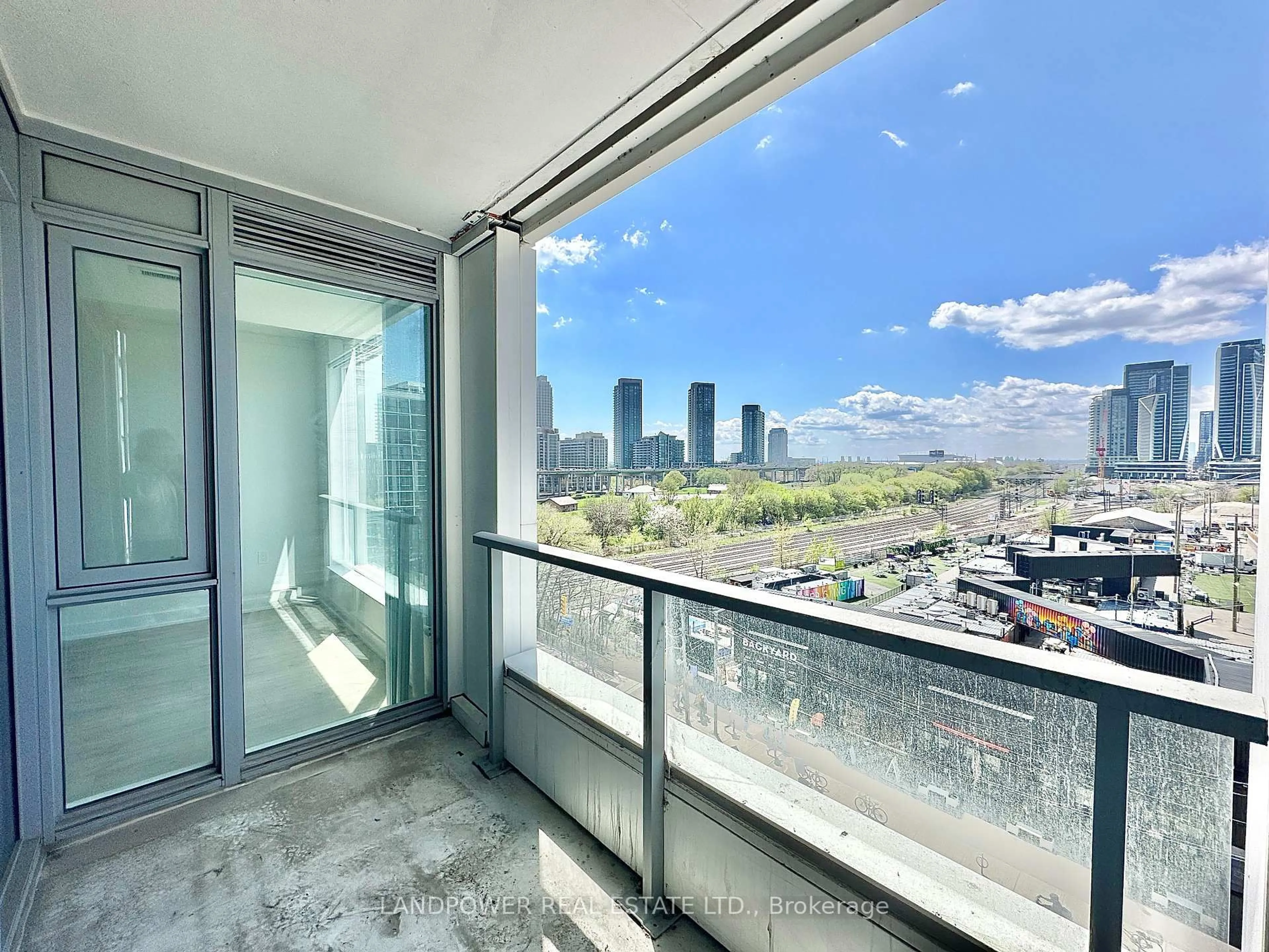 Balcony in the apartment, city buildings view from balcony for 27 Bathurst St #509W, Toronto Ontario M5V 2P1