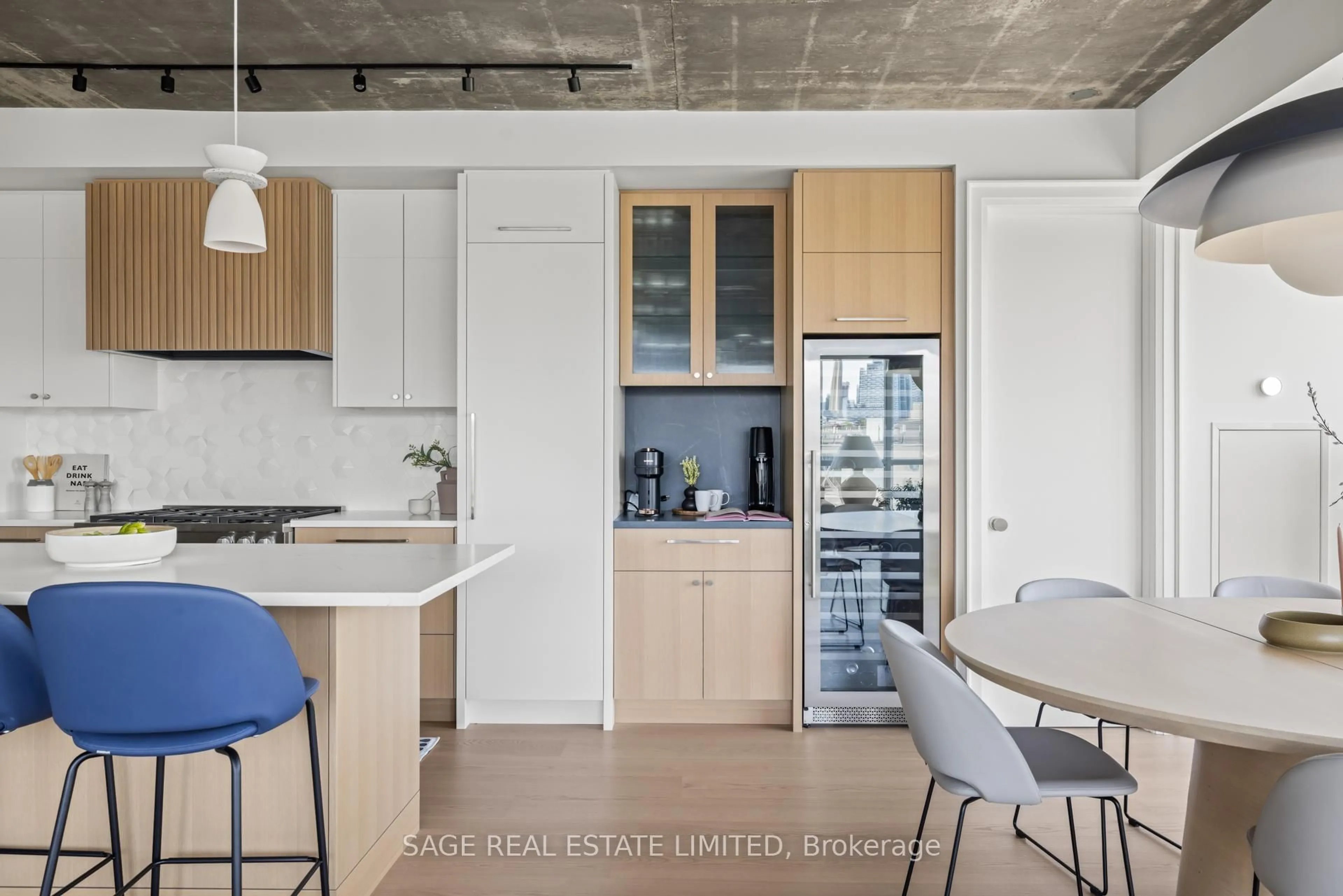 Open concept kitchen, cement floor for 1 Shaw St #912, Toronto Ontario M6K 0A1