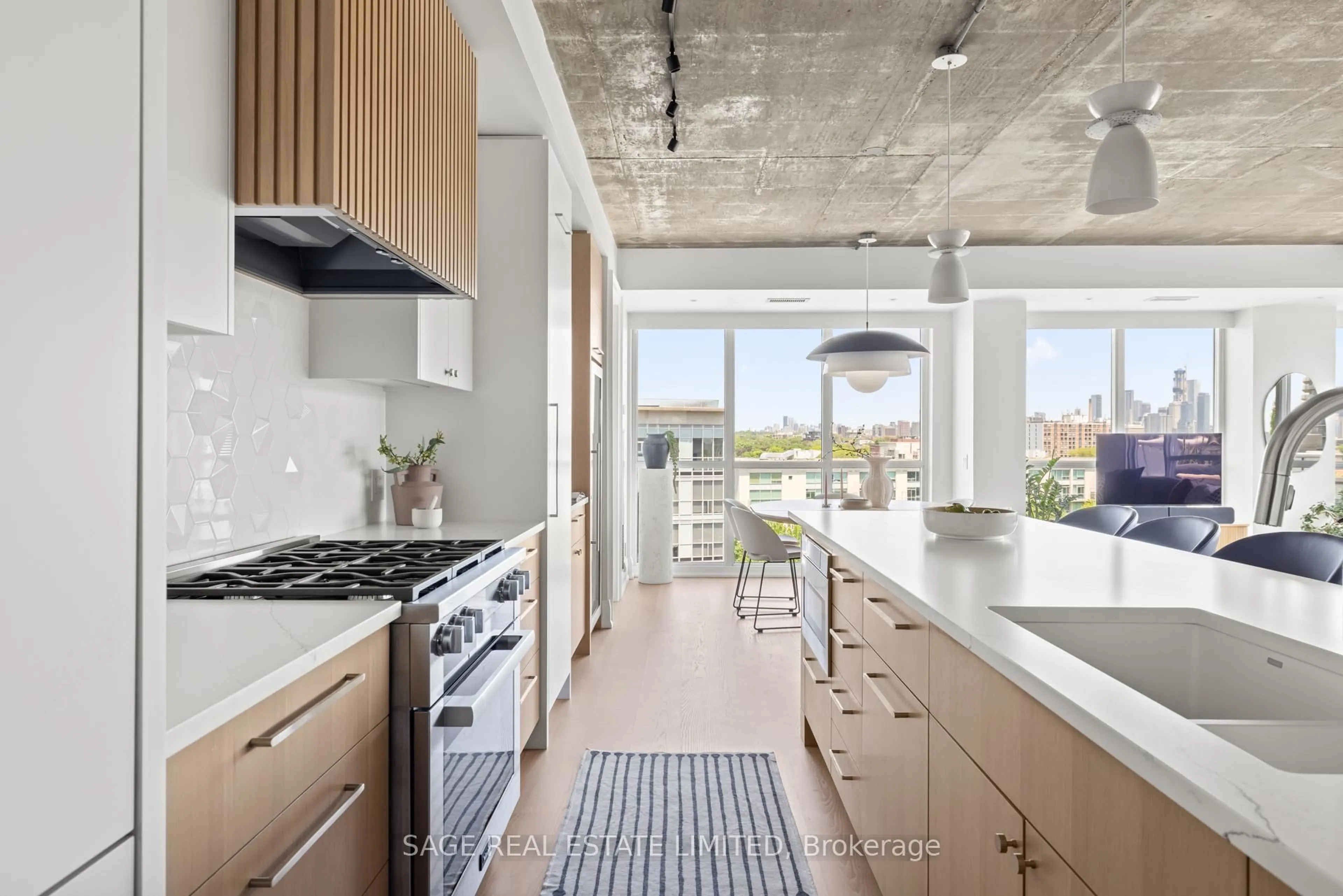 Contemporary kitchen, cement floor for 1 Shaw St #912, Toronto Ontario M6K 0A1