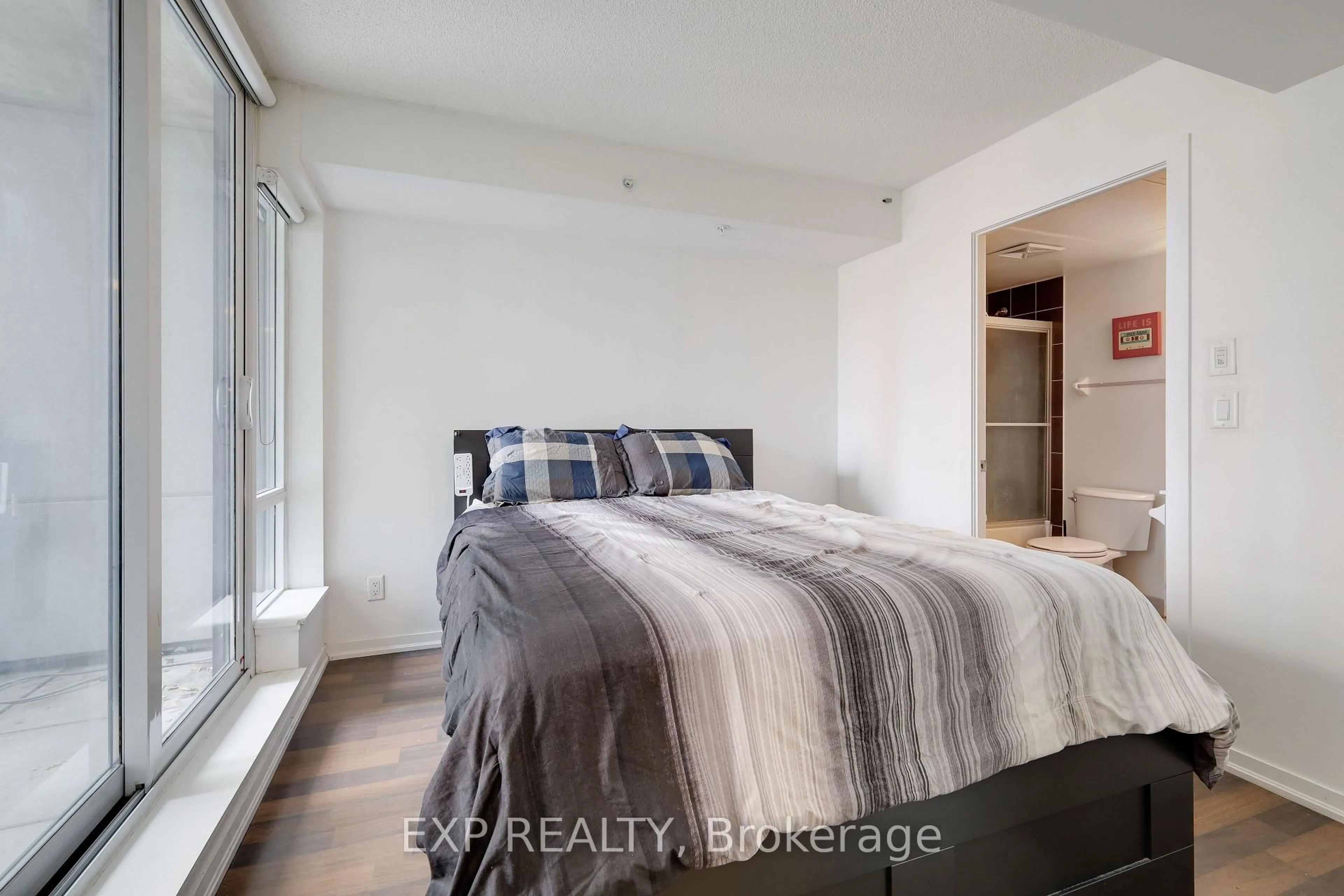 Bedroom with bed, unknown for 20 Joe Shuster Way #322, Toronto Ontario M6K 0A3