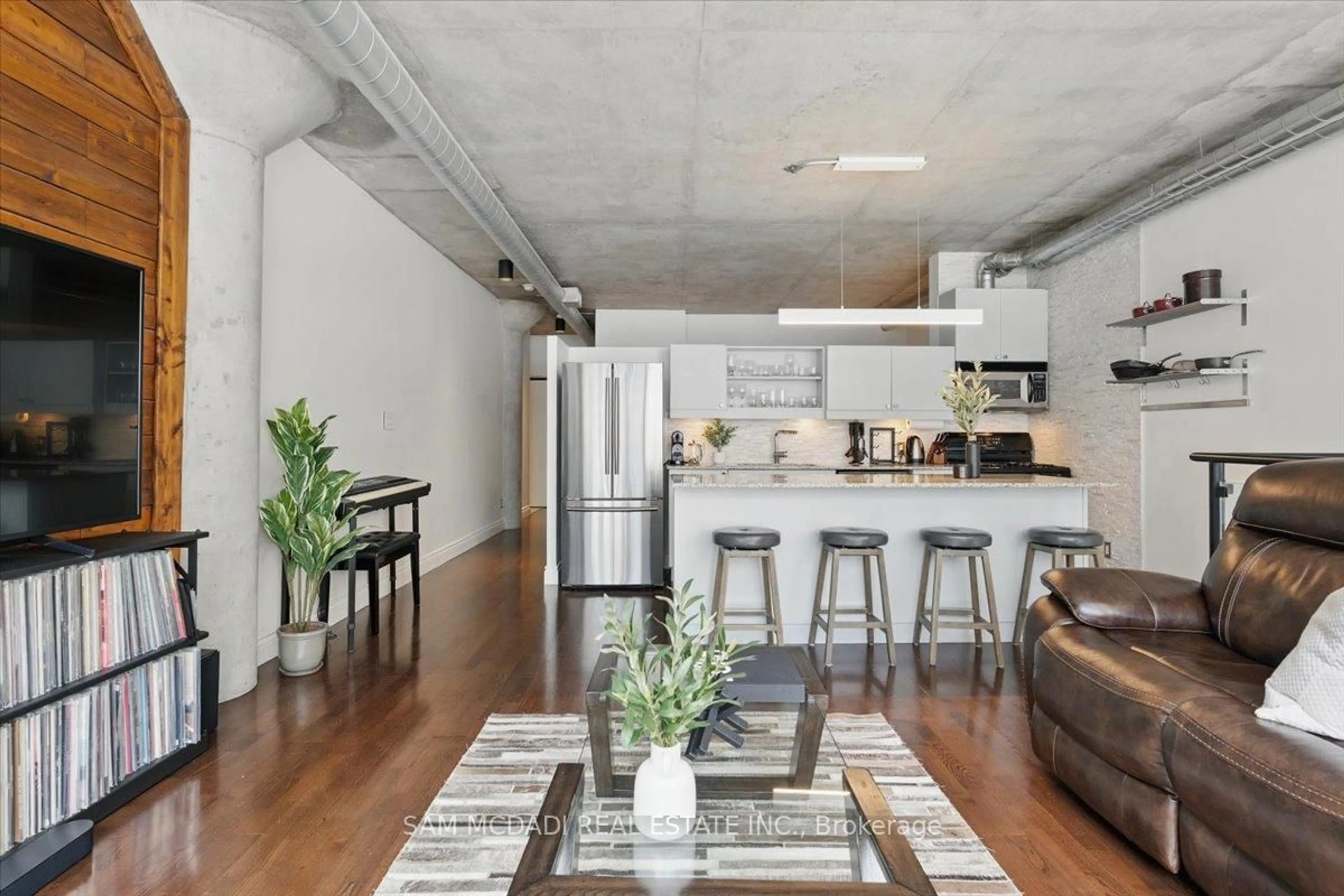 Open concept kitchen, cement floor for 42 Camden St #204, Toronto Ontario M5V 1V1