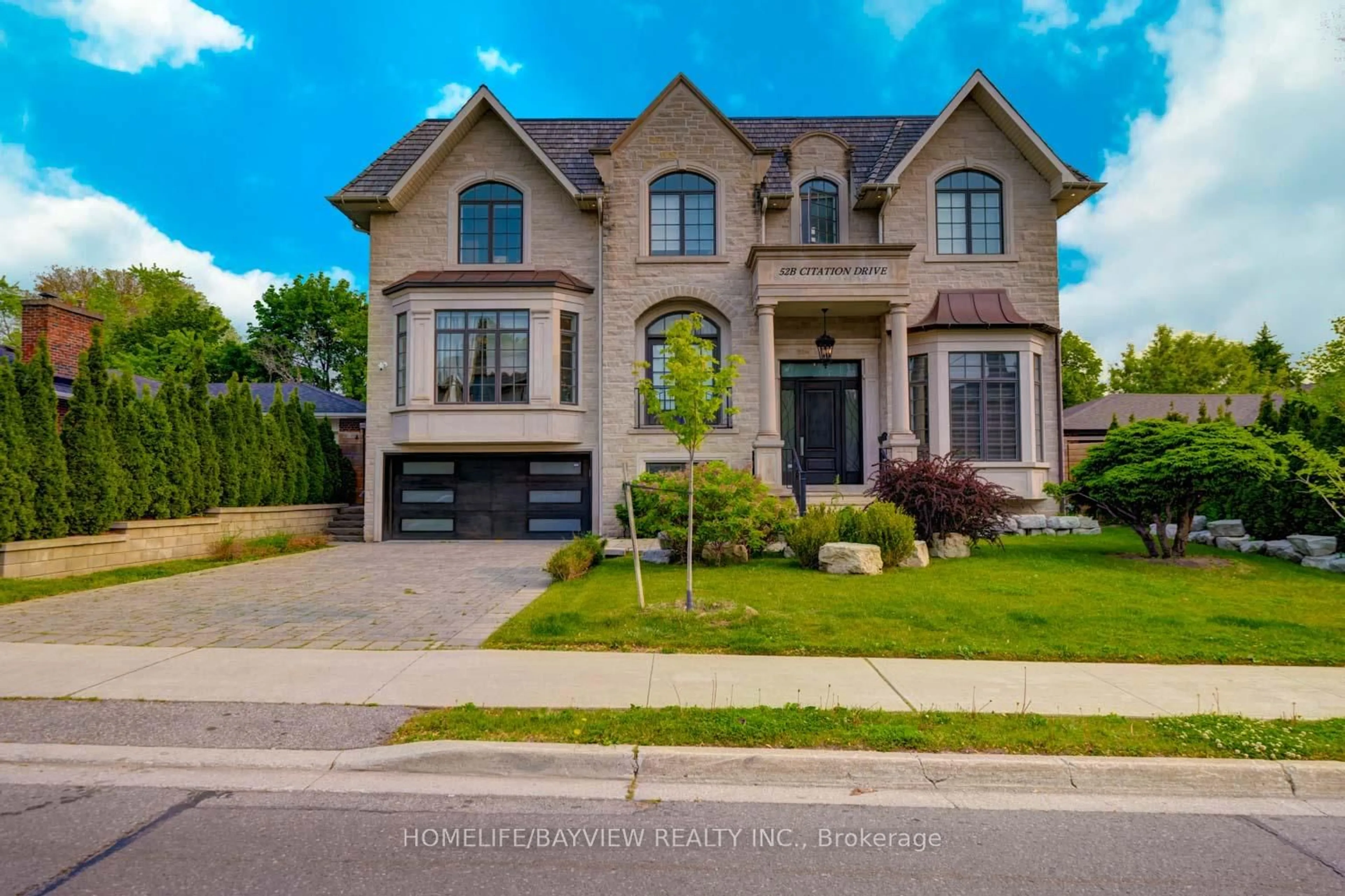 Home with brick exterior material, street for 52B Citation Dr, Toronto Ontario M2K 1S7