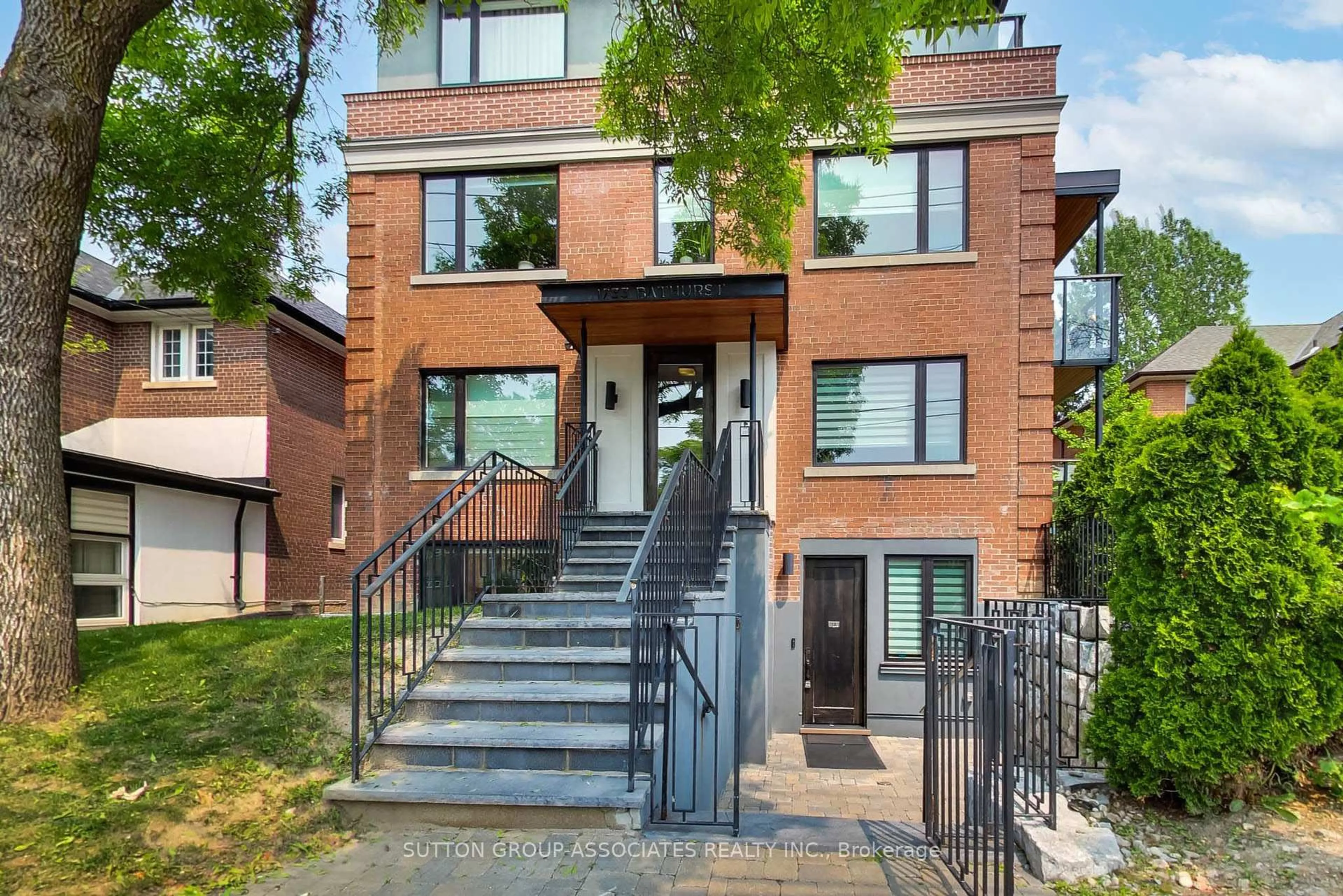 Home with brick exterior material, street for 1733 Bathurst St #1A, Toronto Ontario M5P 3K4