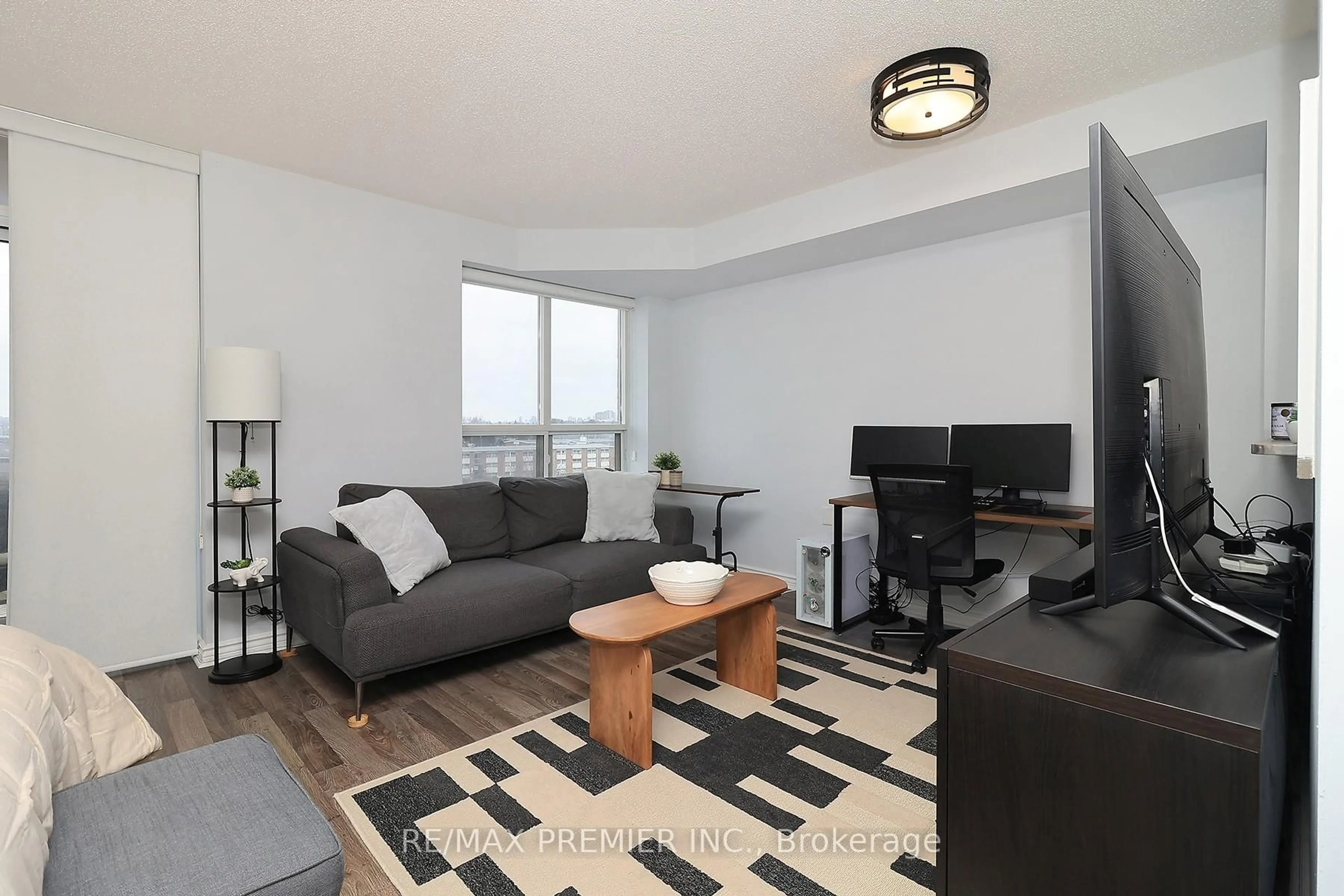 Living room with furniture, wood/laminate floor for 650 Lawrence Ave #721, Toronto Ontario M6A 3E8