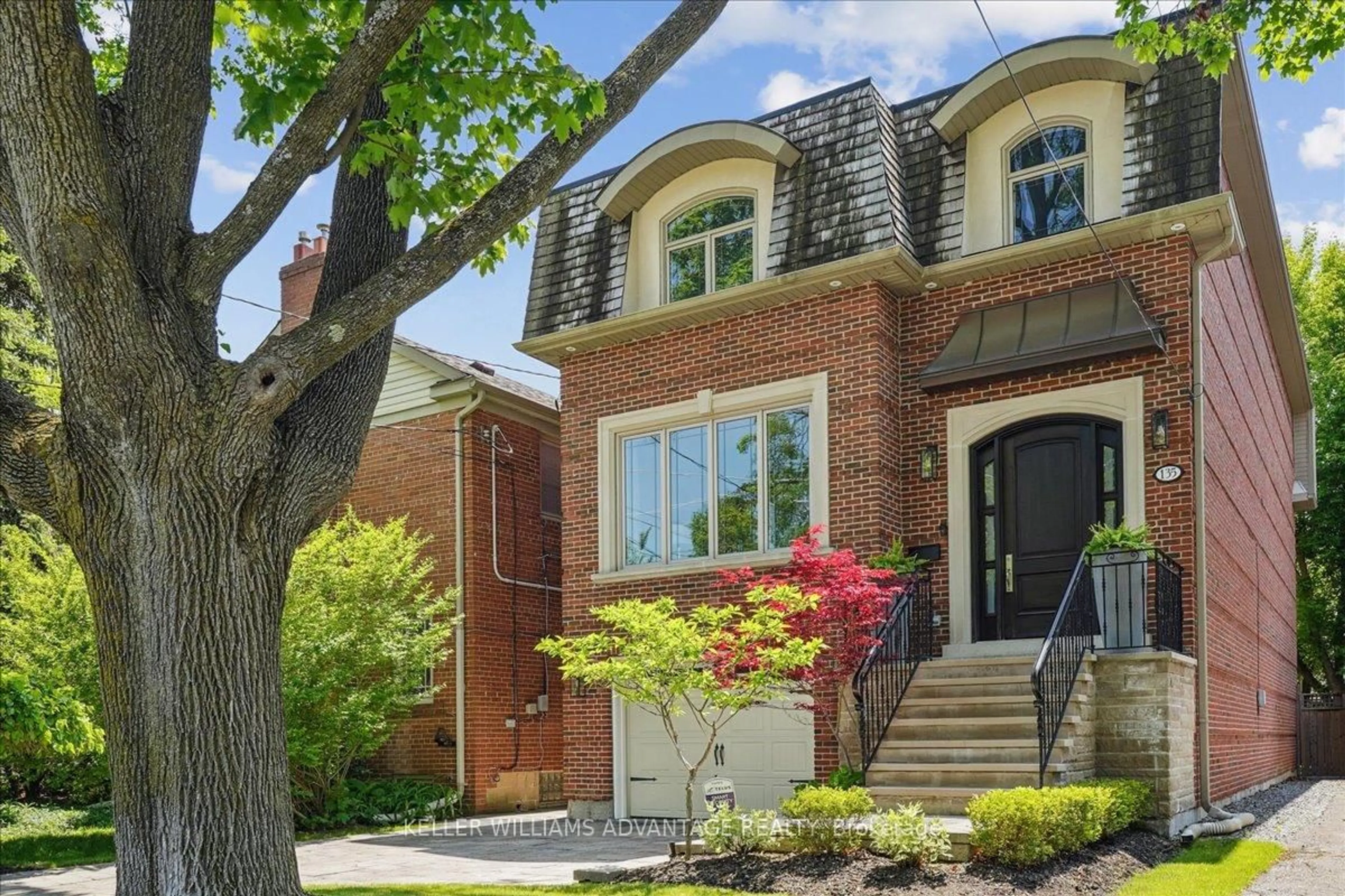 Home with brick exterior material, street for 135 Glenvale Blvd, Toronto Ontario M4G 2W1