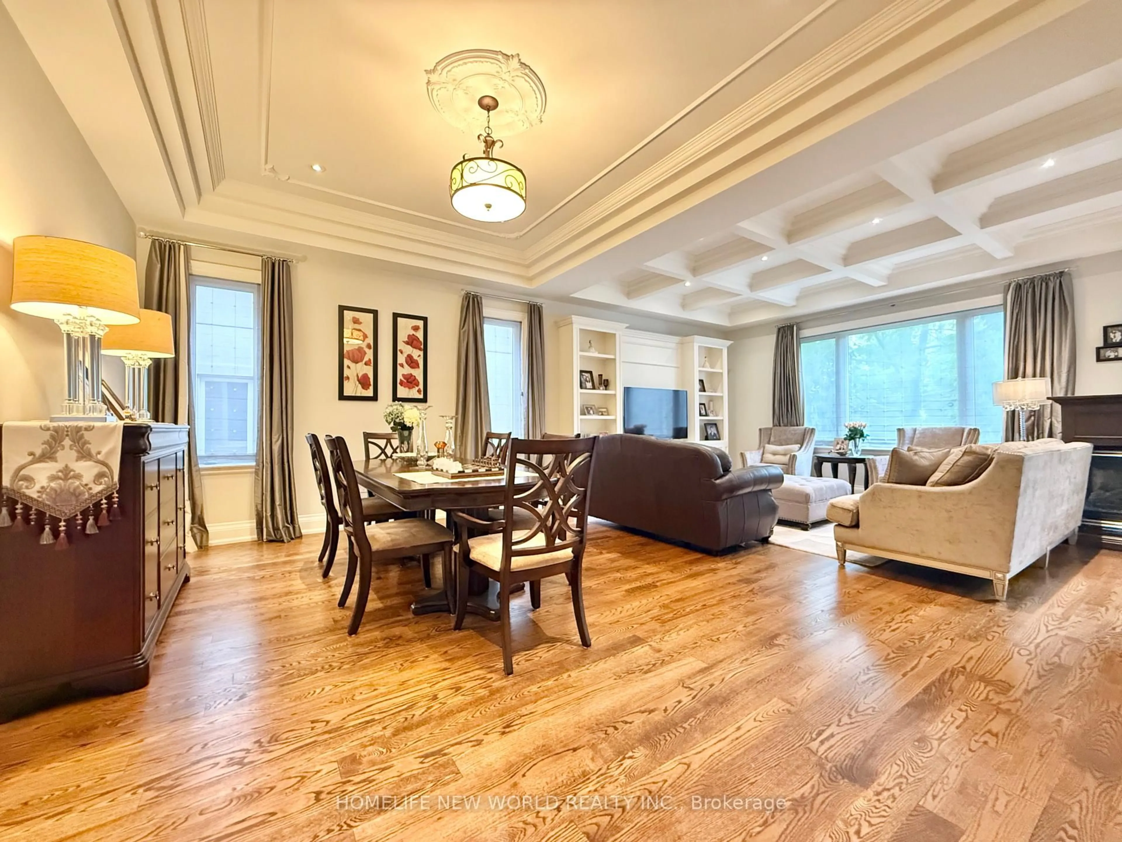 Living room with furniture, wood/laminate floor for 129 York Downs Dr, Toronto Ontario M3H 2G6