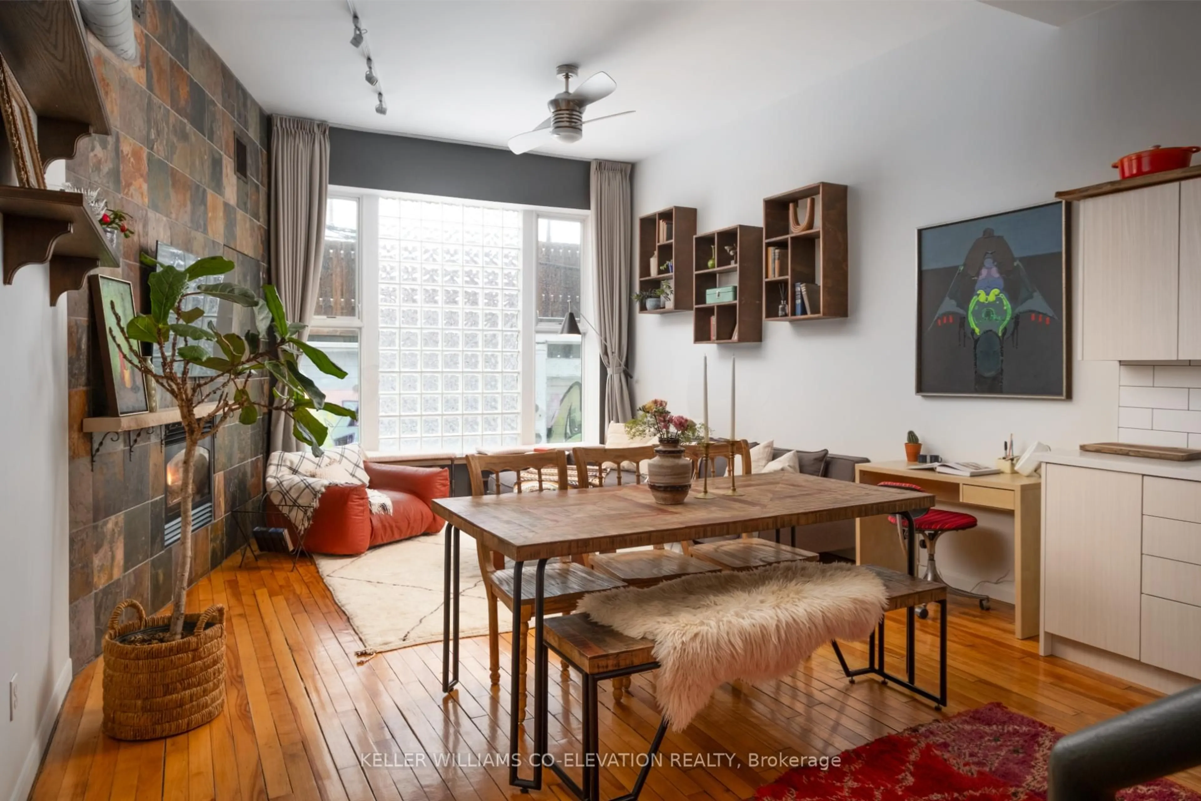 Living room with furniture, wood/laminate floor for 670 Richmond St #105, Toronto Ontario M6J 1C3