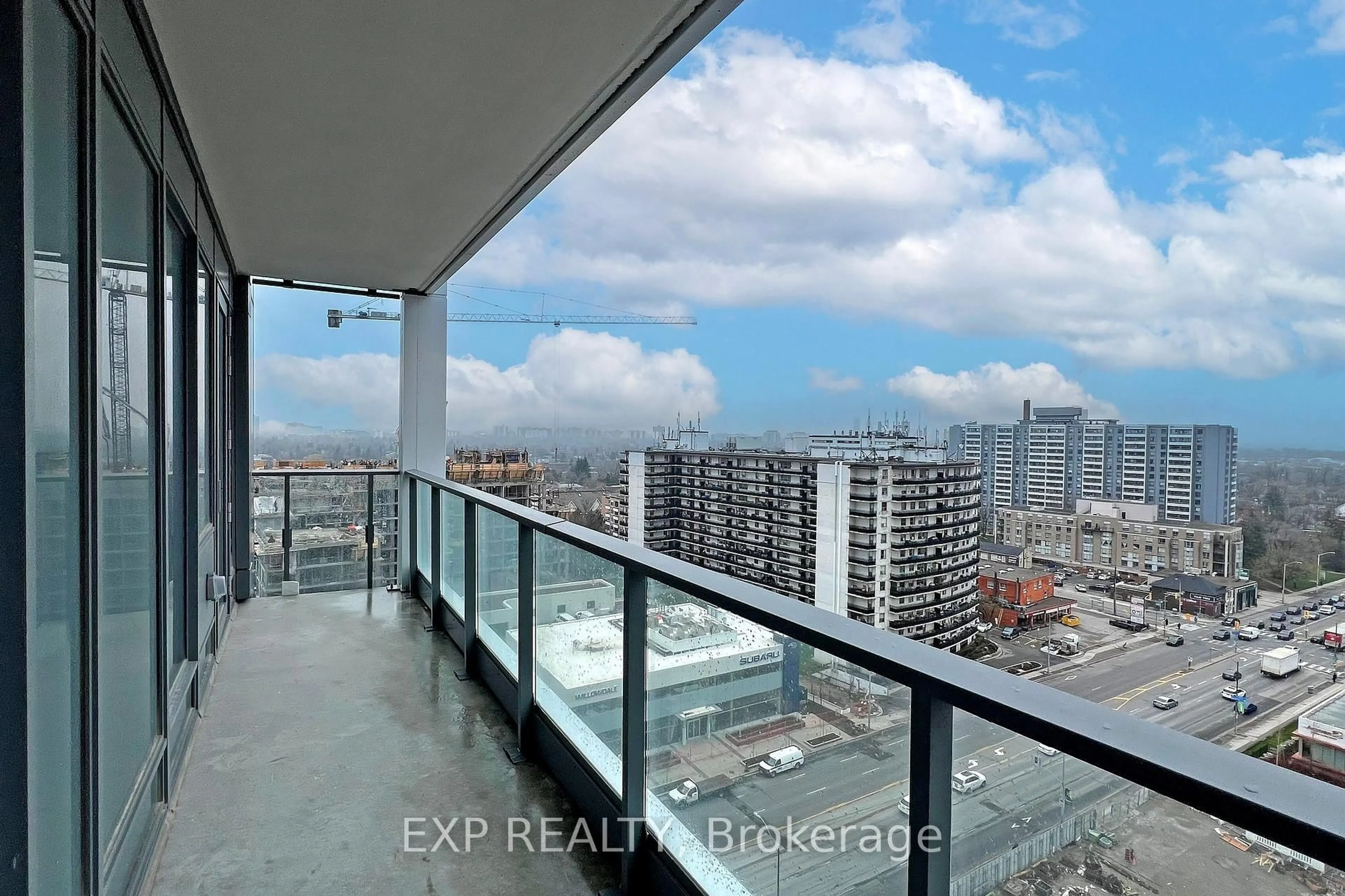 Balcony in the apartment, city buildings view from balcony for 7 Golden Lion Hts Ave #1409, Toronto Ontario M2M 0C1