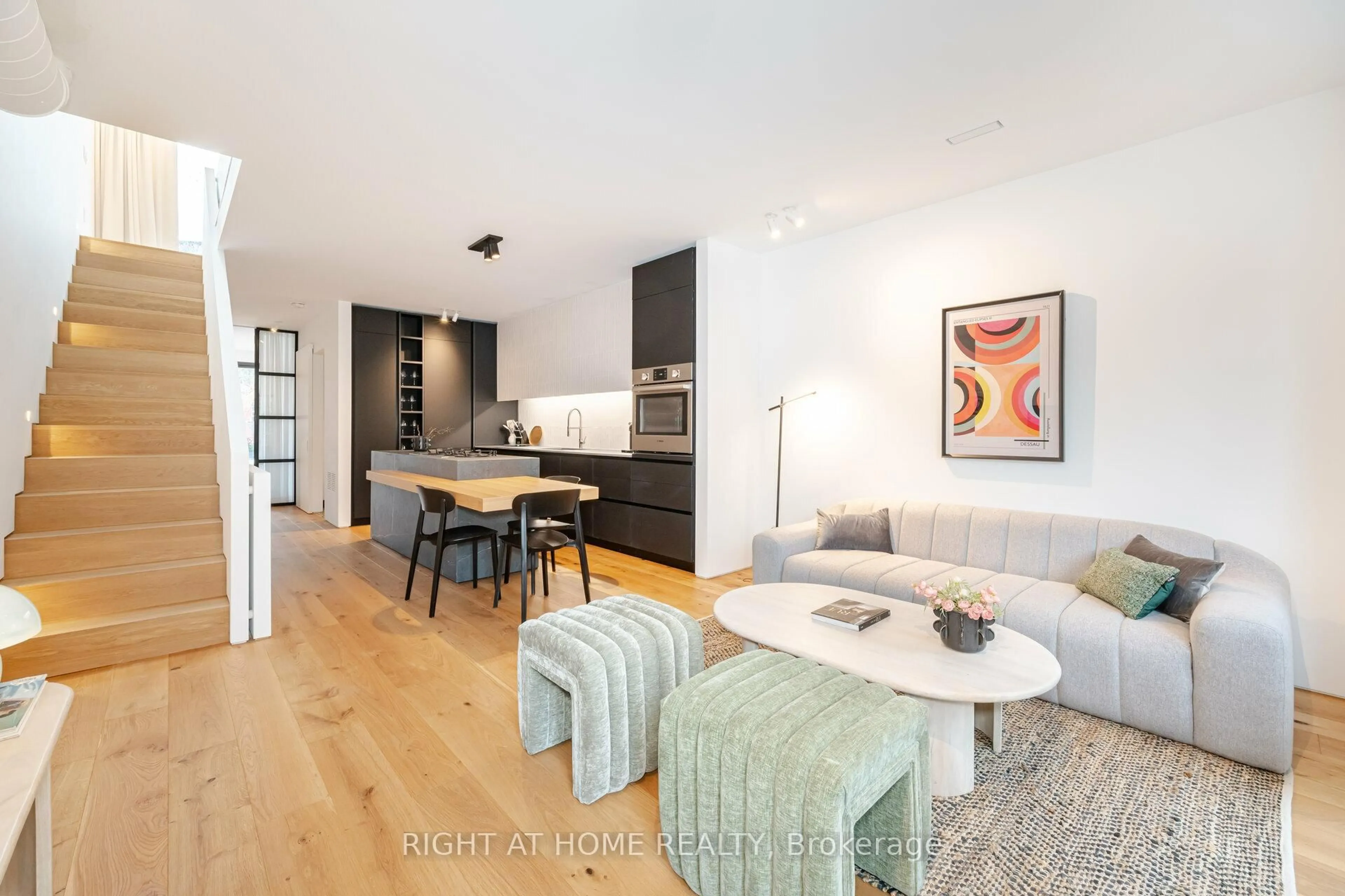 Open concept kitchen, wood/laminate floor for 259 Lisgar St, Toronto Ontario M6J 3G8
