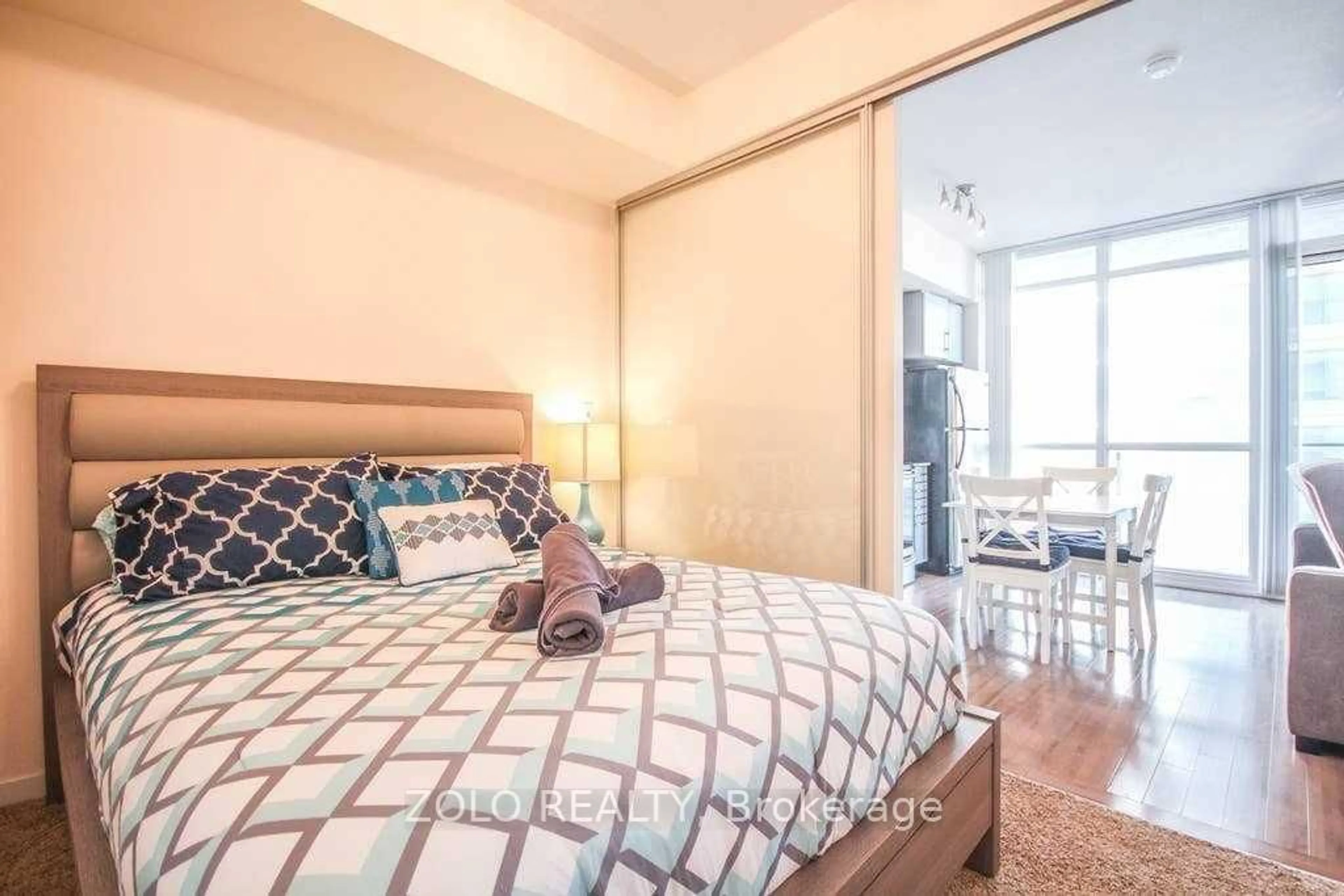 Bedroom with bed, carpet floor for 65 Bremner Blvd #2007, Toronto Ontario M5J 0A7