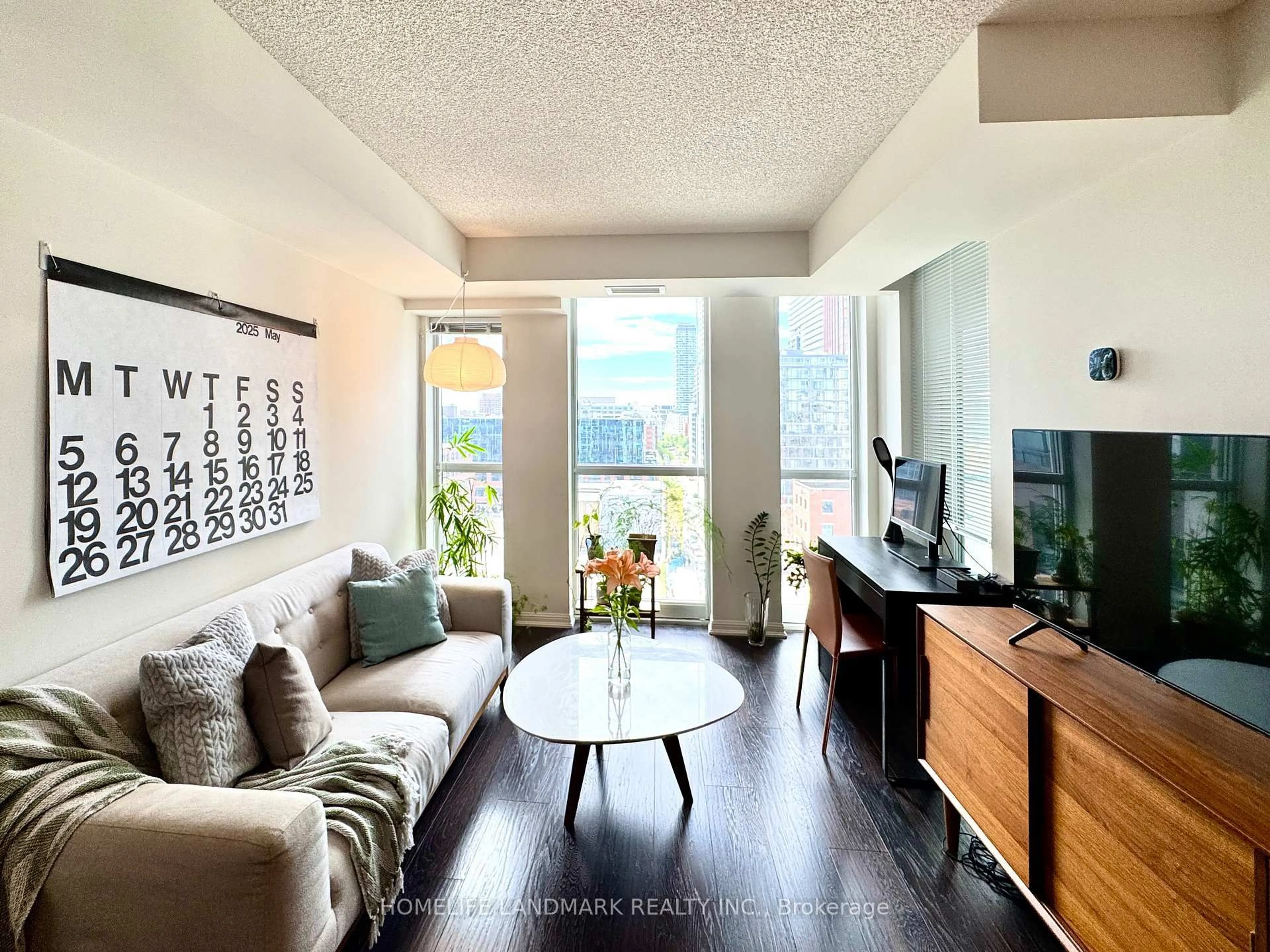Living room with furniture, wood/laminate floor for 400 Adelaide St #1120, Toronto Ontario M5A 4S3
