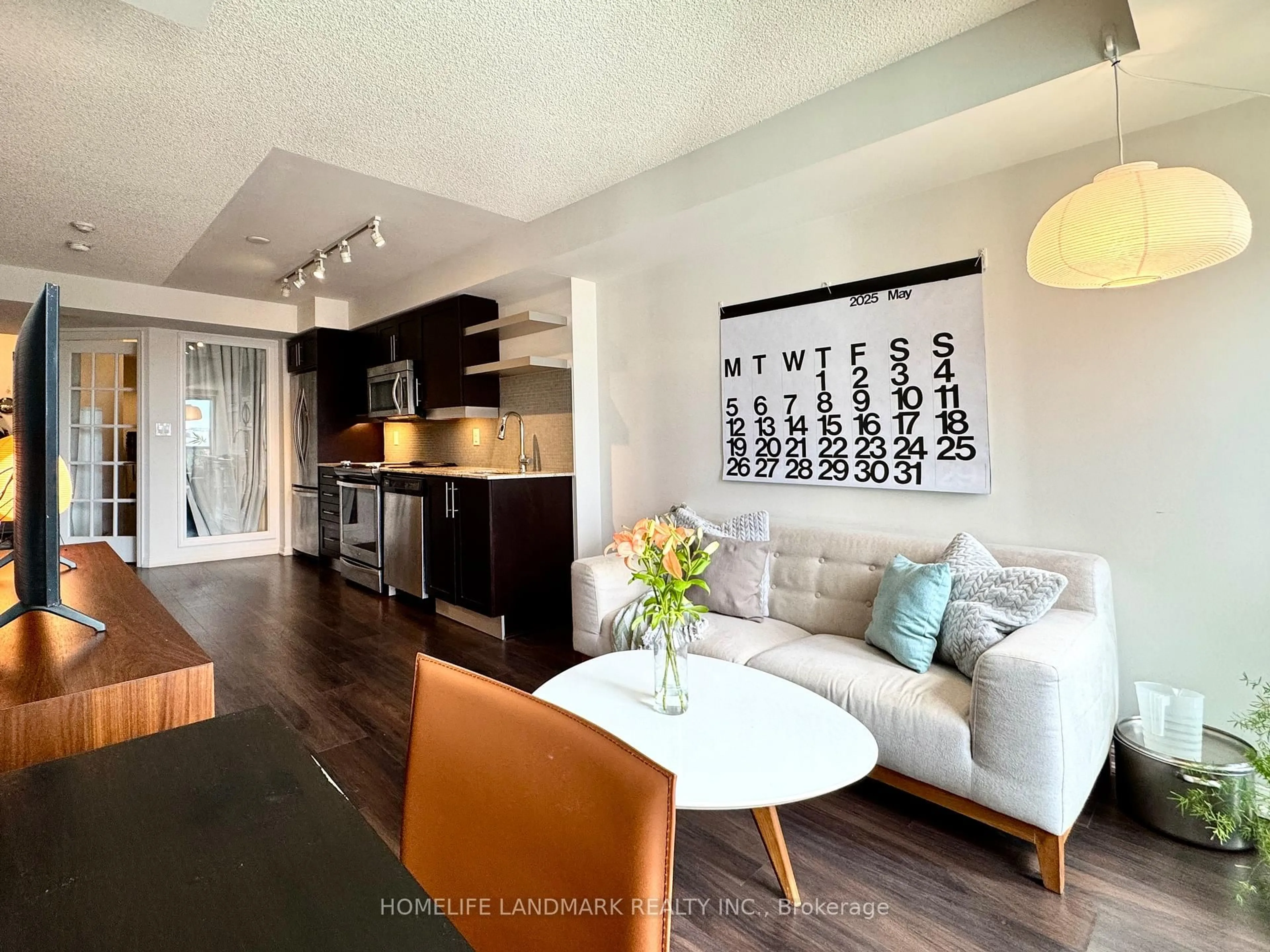 Living room with furniture, wood/laminate floor for 400 Adelaide St #1120, Toronto Ontario M5A 4S3