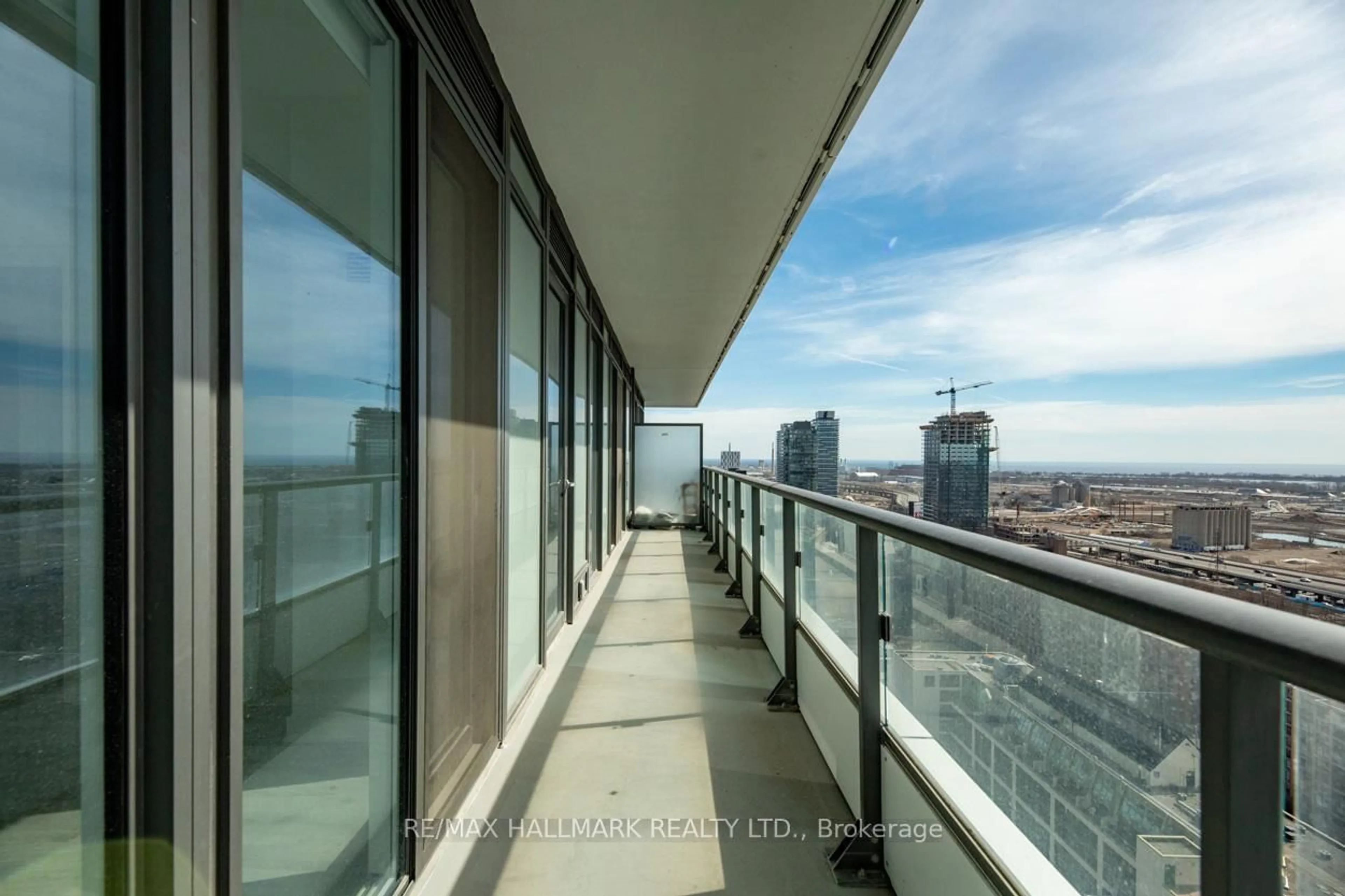 Balcony in the apartment, city buildings view from balcony for 70 Princess St #2408, Toronto Ontario M5A 0X6