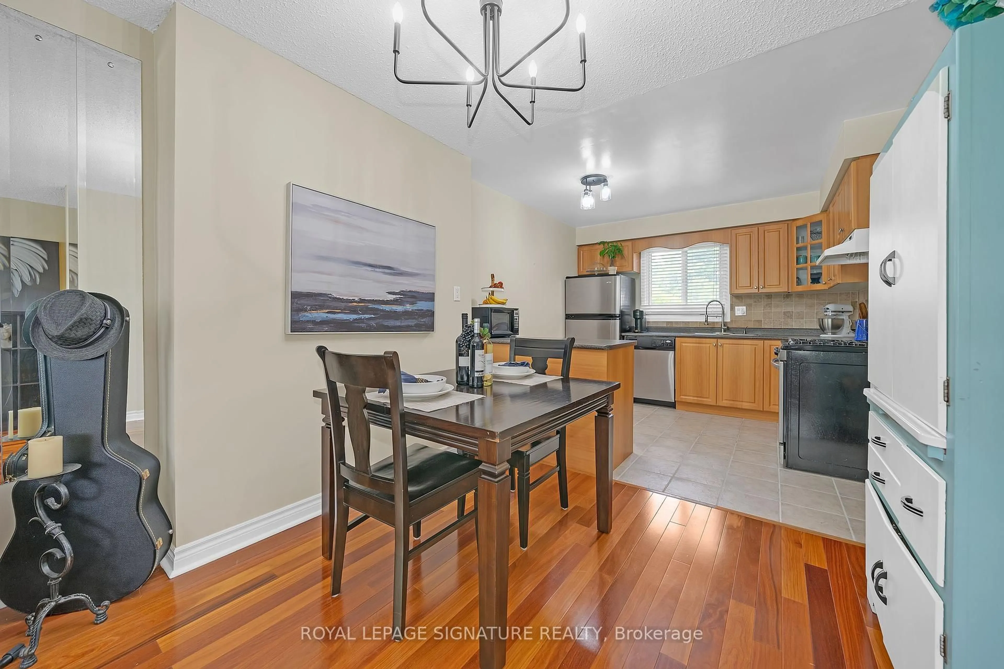 Open concept kitchen, wood/laminate floor for 5 Early Apple Way, Toronto Ontario M3A 3N4