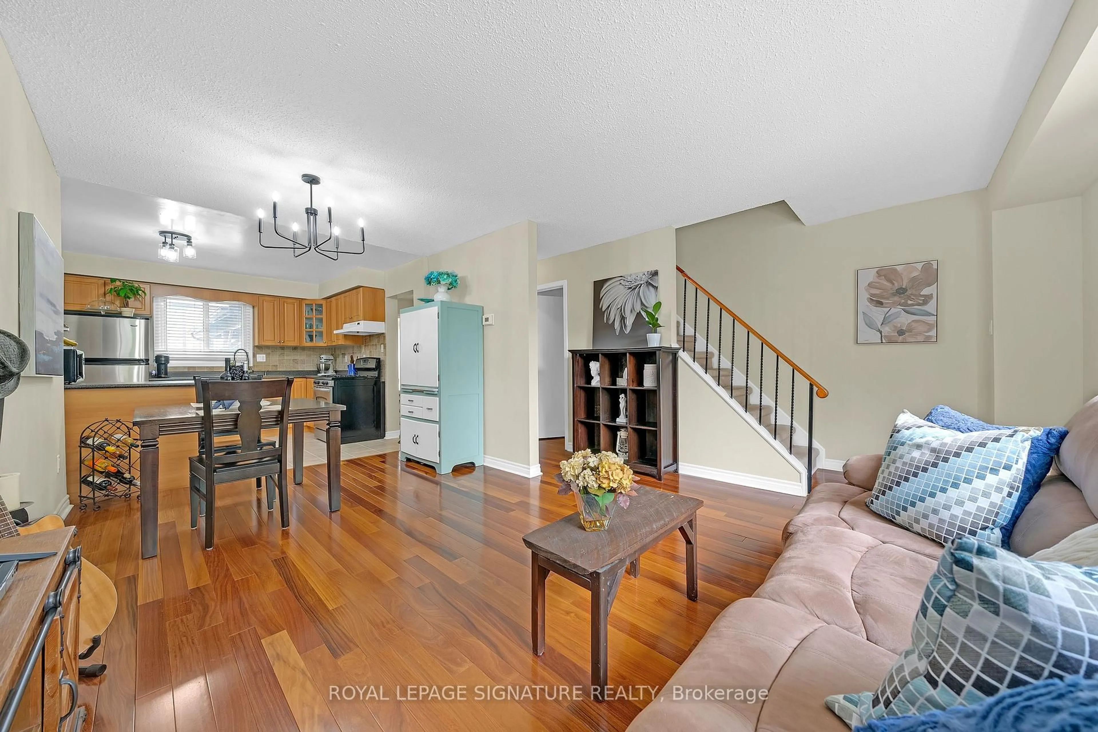 Living room with furniture, wood/laminate floor for 5 Early Apple Way, Toronto Ontario M3A 3N4