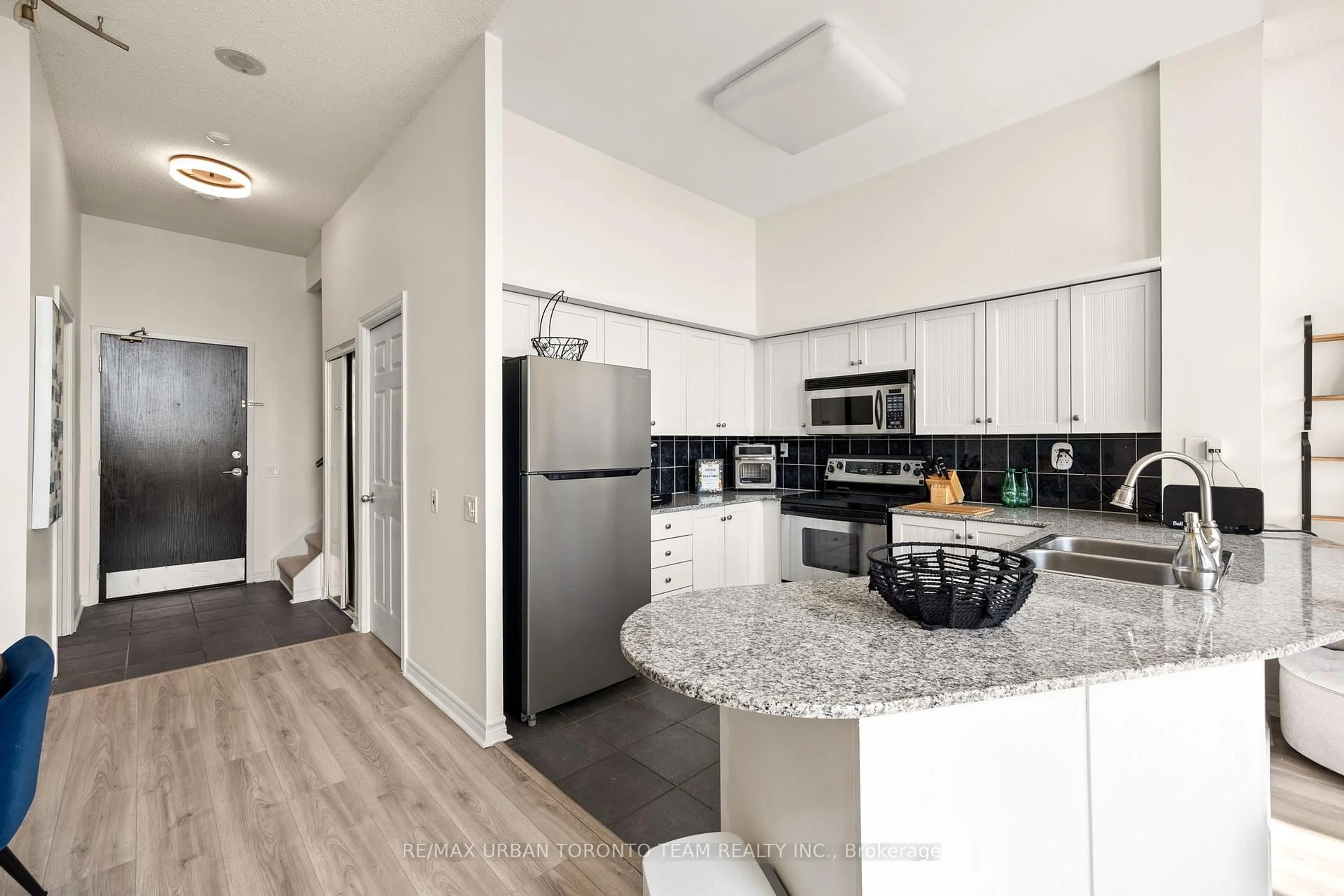 Open concept kitchen, ceramic/tile floor for 1720 Eglinton Ave #108, Toronto Ontario M4A 1J7