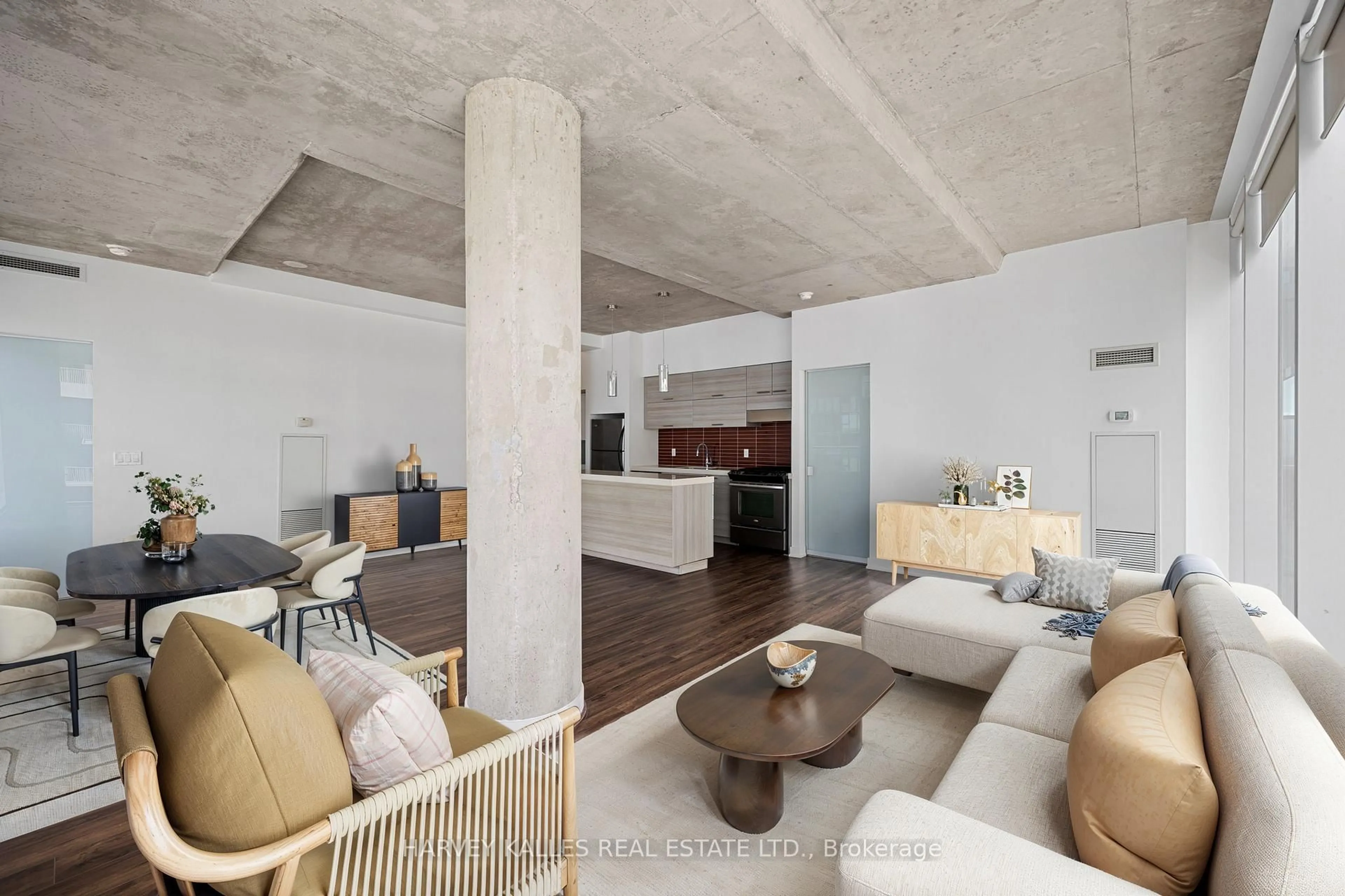 Living room with furniture, cement floor for 552 Wellington St #1305, Toronto Ontario M5V 2V5