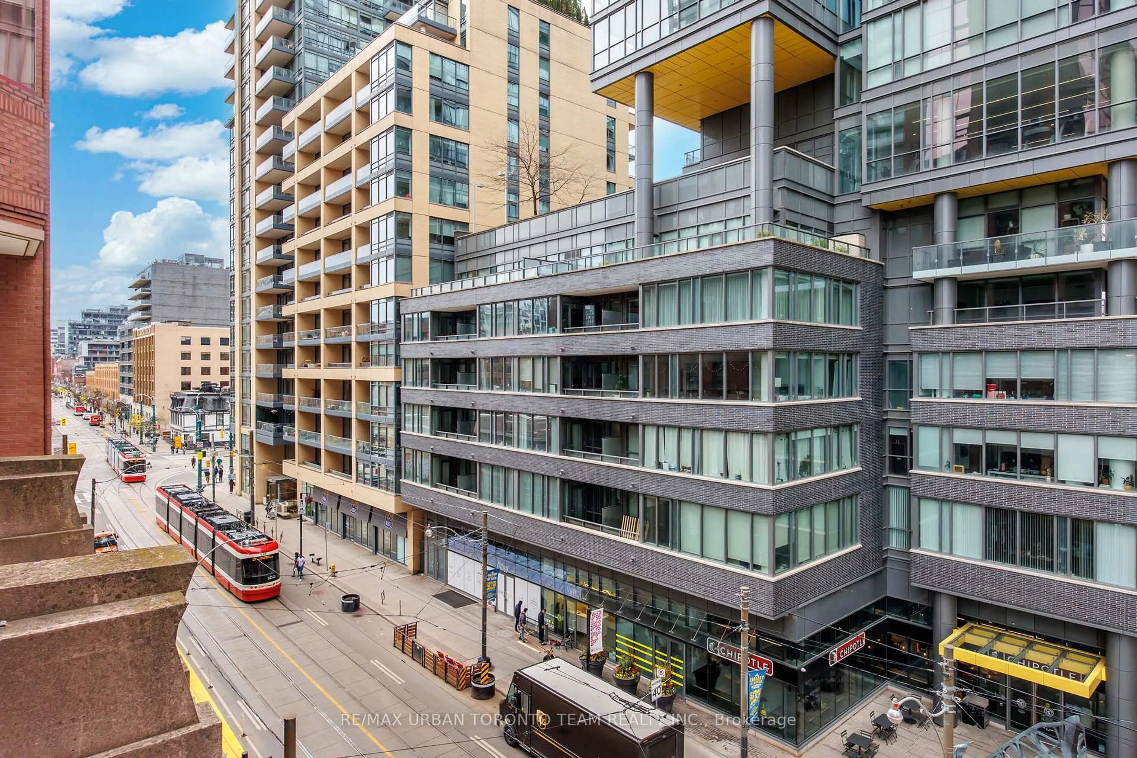 A pic from outside/outdoor area/front of a property/back of a property/a pic from drone, city buildings view from balcony for 393 King St #401, Toronto Ontario M5V 3G8