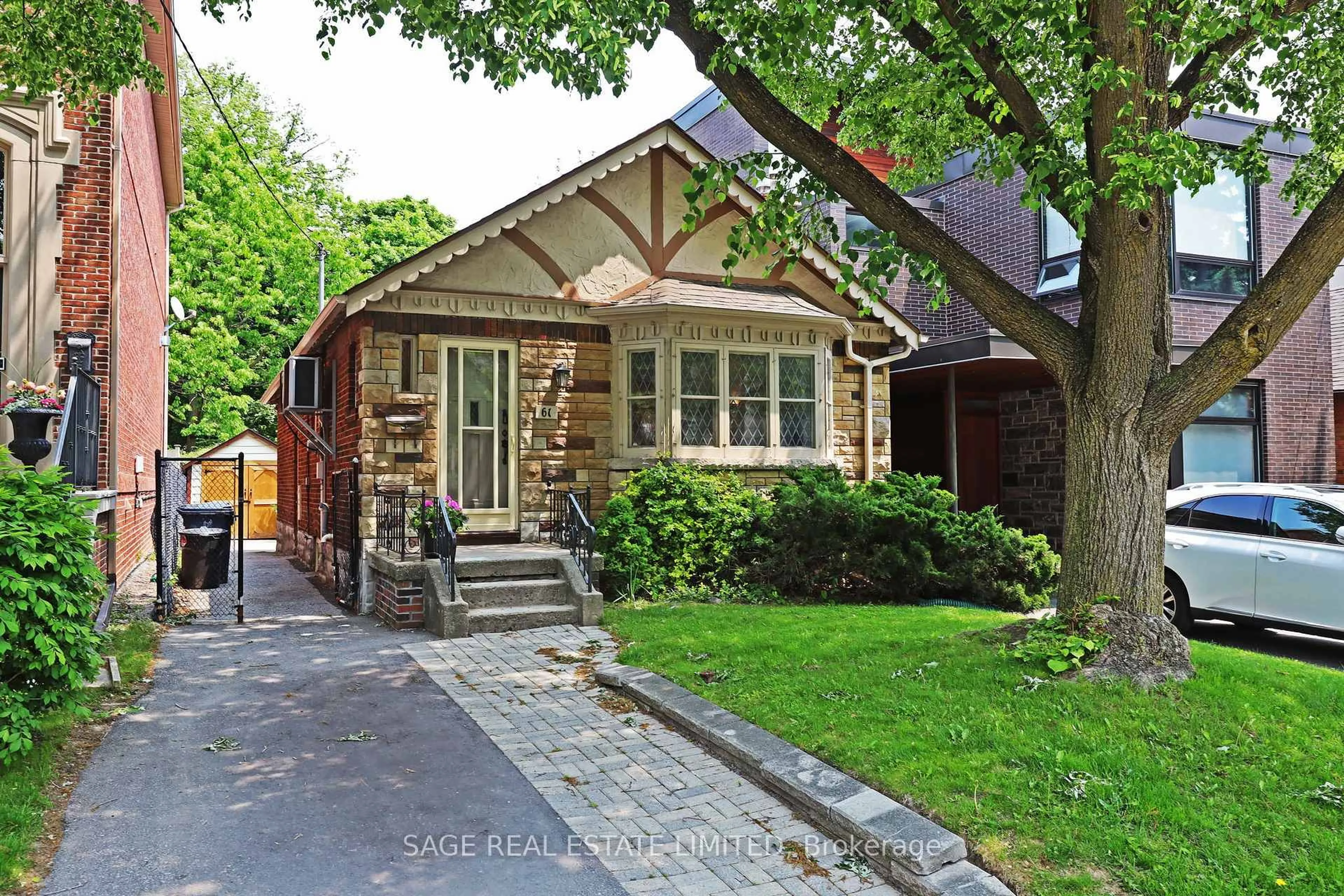 Home with brick exterior material, street for 61 Banff Rd, Toronto Ontario M4S 2V6
