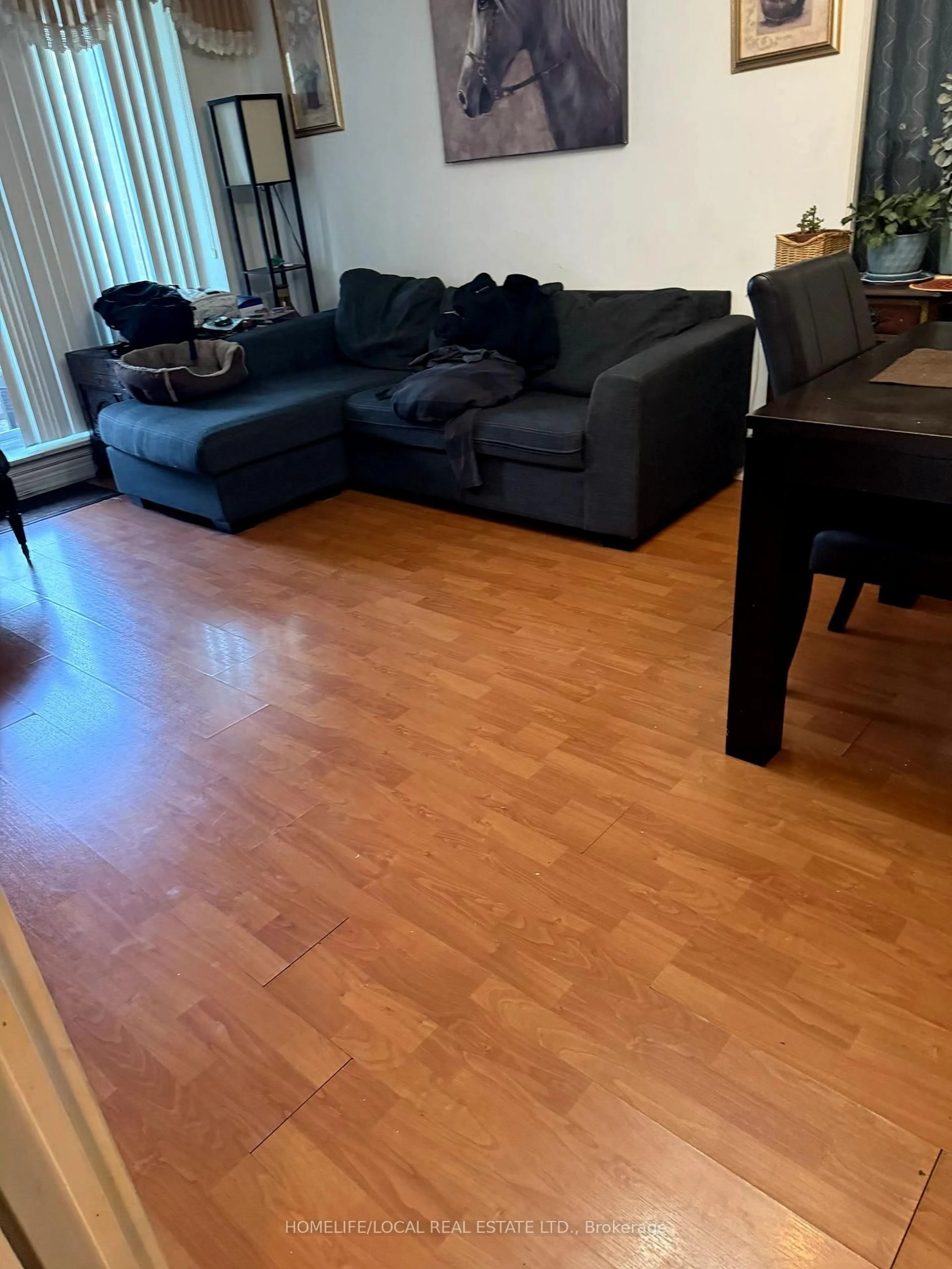 Living room with furniture, wood/laminate floor for 1369 Bloor St #316, Toronto Ontario M6P 4J4