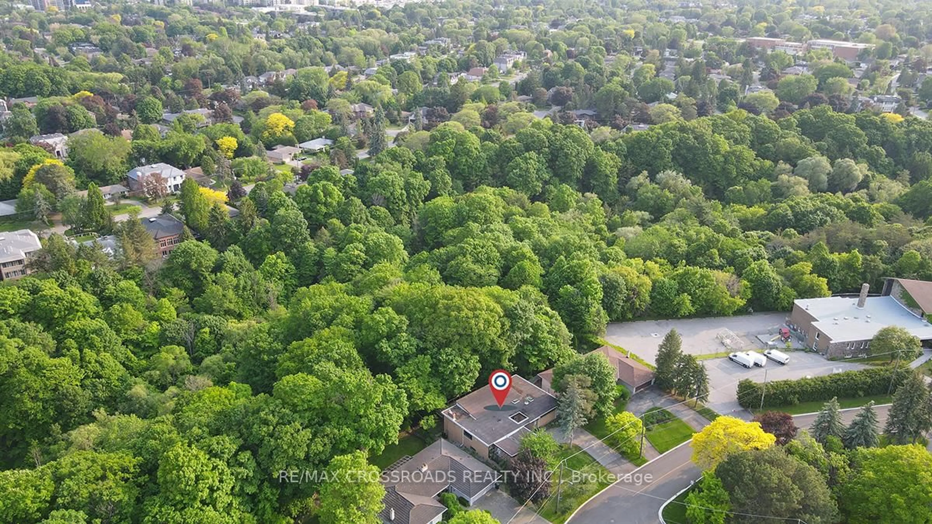 A pic from outside/outdoor area/front of a property/back of a property/a pic from drone, forest/trees view for 53 Forest Grove Dr, Toronto Ontario M2K 1Z4