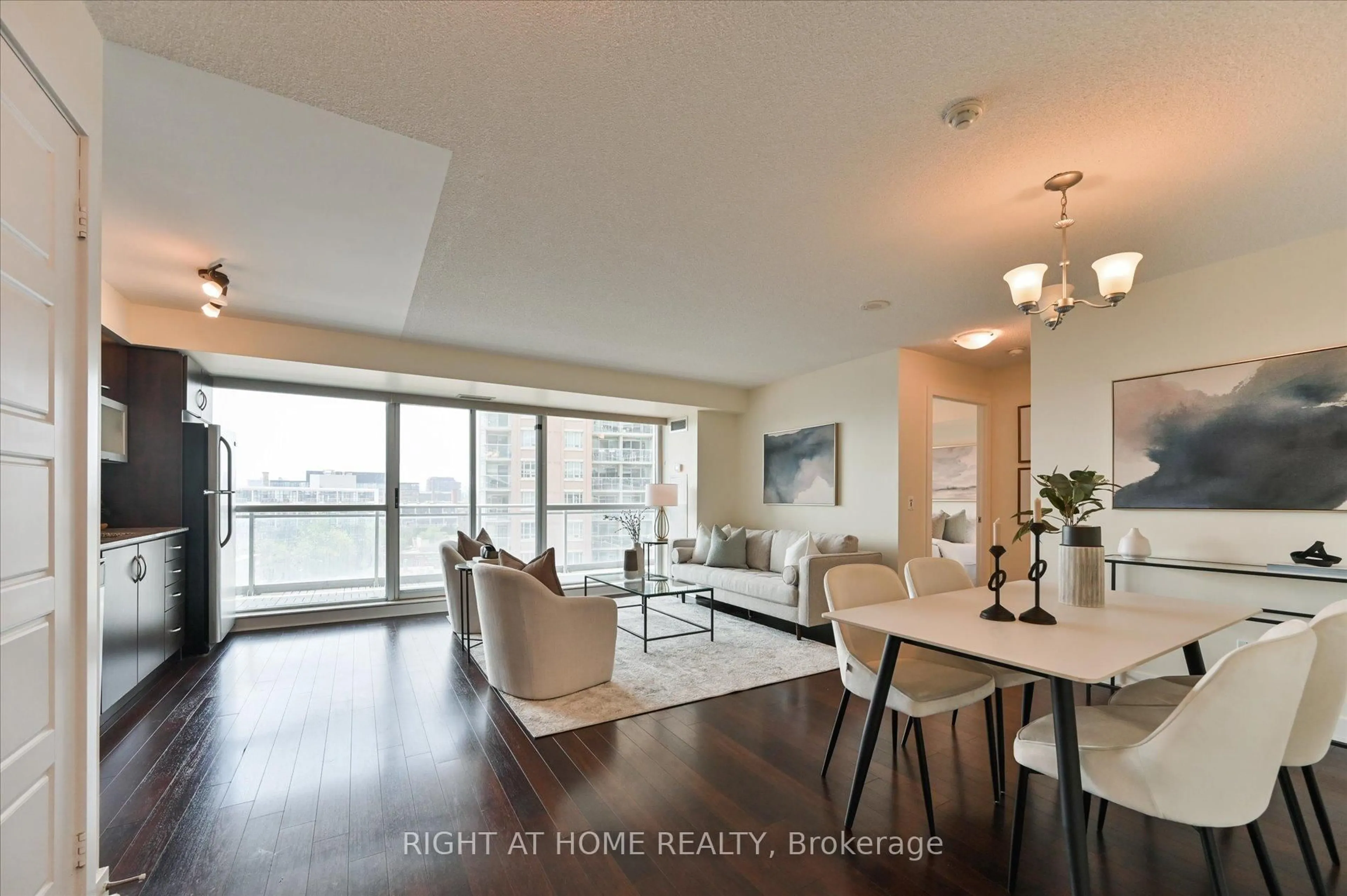 Living room with furniture, wood/laminate floor for 100 Western Battery Rd #806, Toronto Ontario M6K 3S2