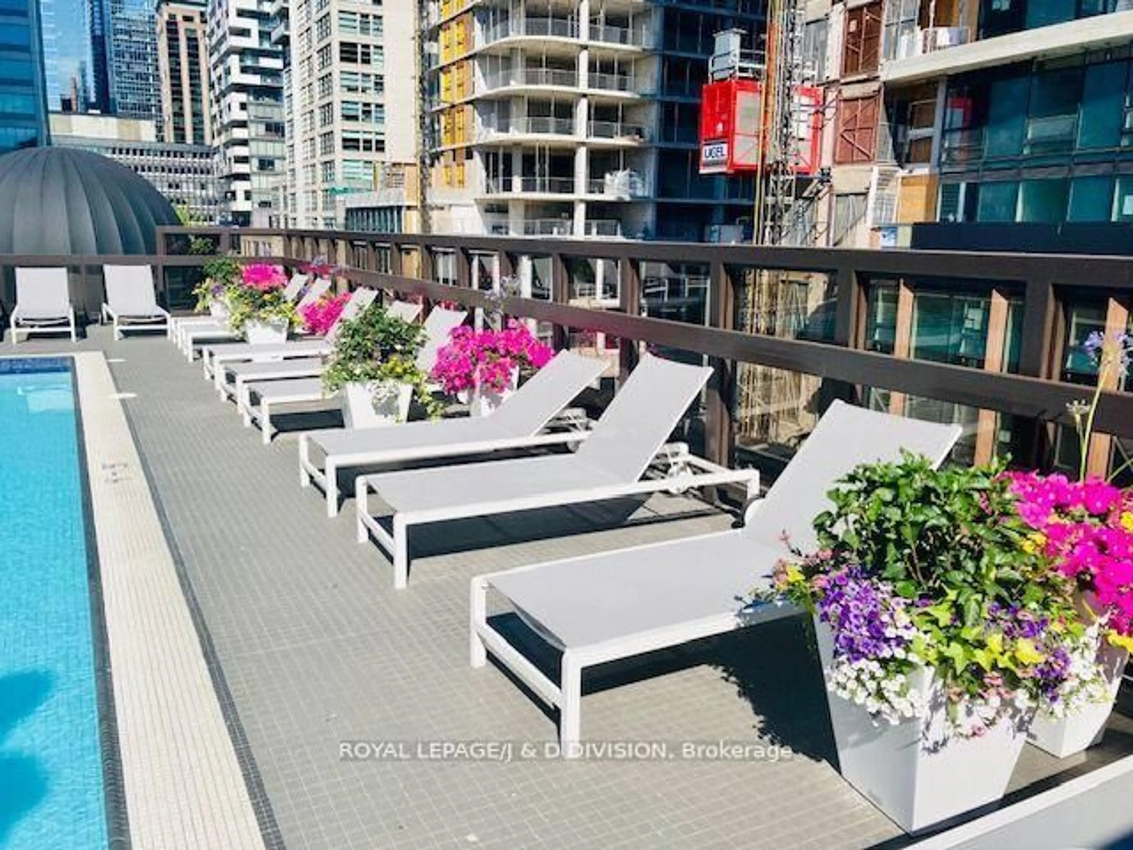 Patio, city buildings view from balcony for 55 Lombard St #204, Toronto Ontario M5C 2R7