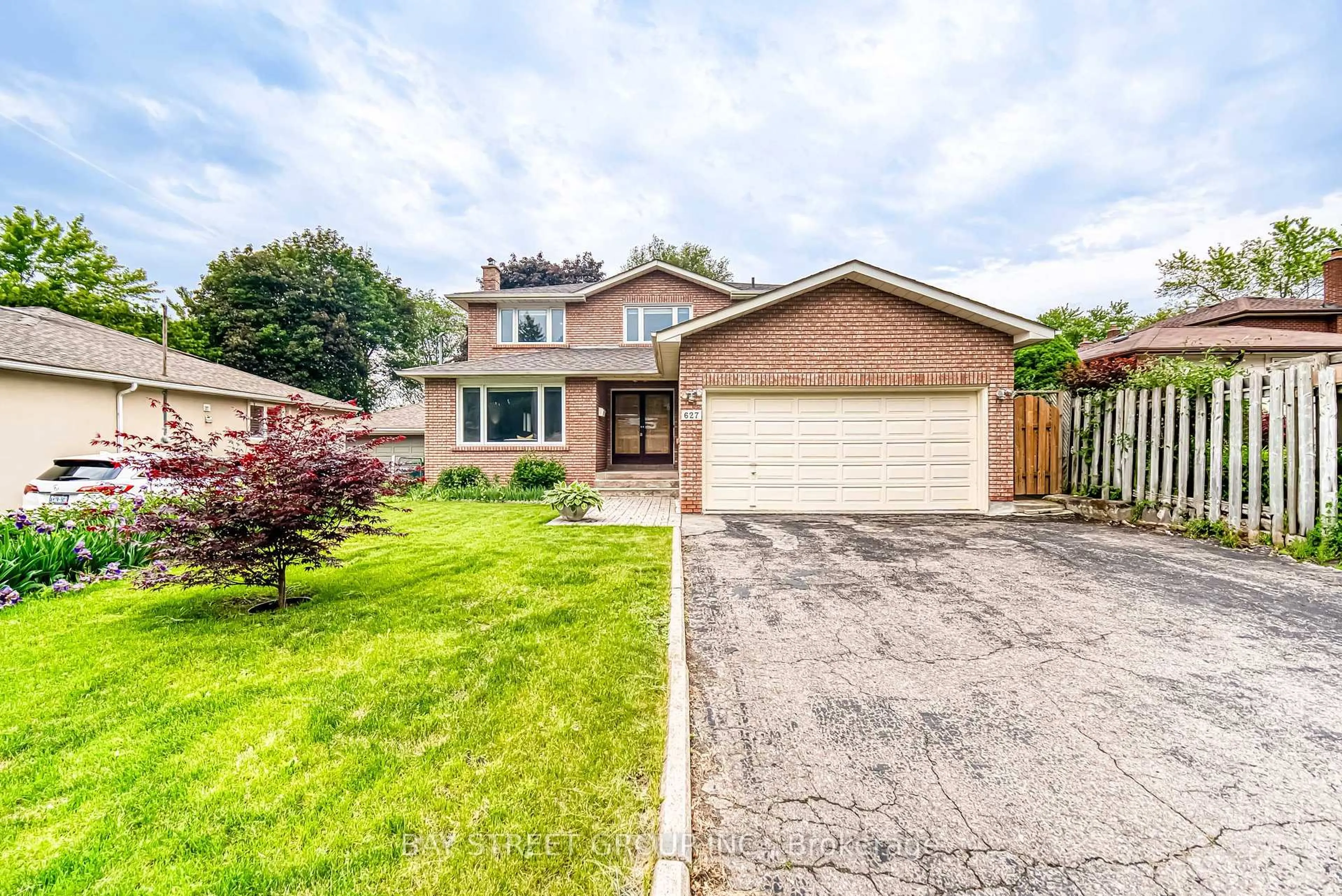 Home with brick exterior material, street for 627 Conacher Dr, Toronto Ontario M2M 3N2