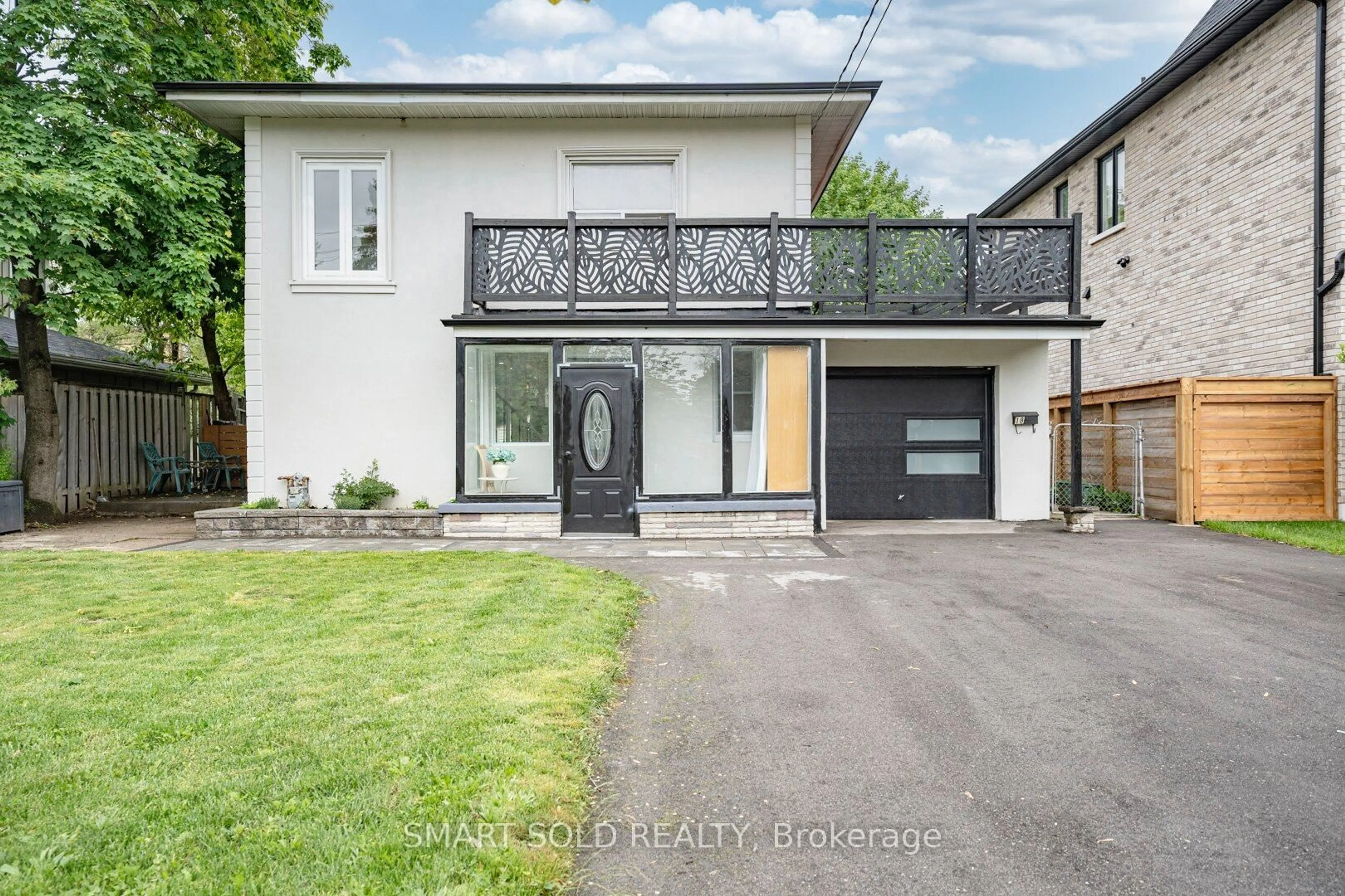 Home with brick exterior material, street for 18 Cadillac Ave, Toronto Ontario M3H 1R9