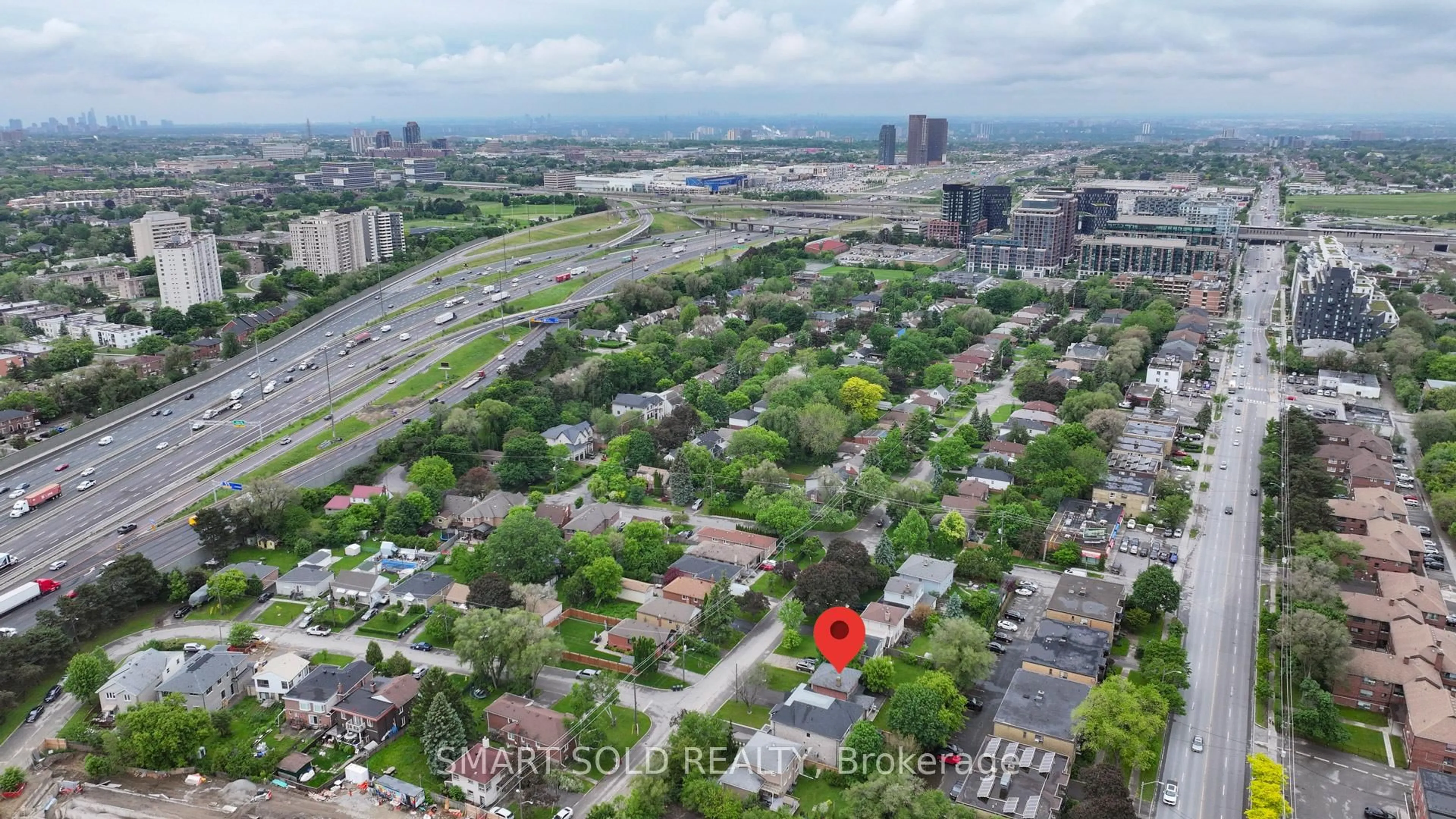 A pic from outside/outdoor area/front of a property/back of a property/a pic from drone, city buildings view from balcony for 18 Cadillac Ave, Toronto Ontario M3H 1R9
