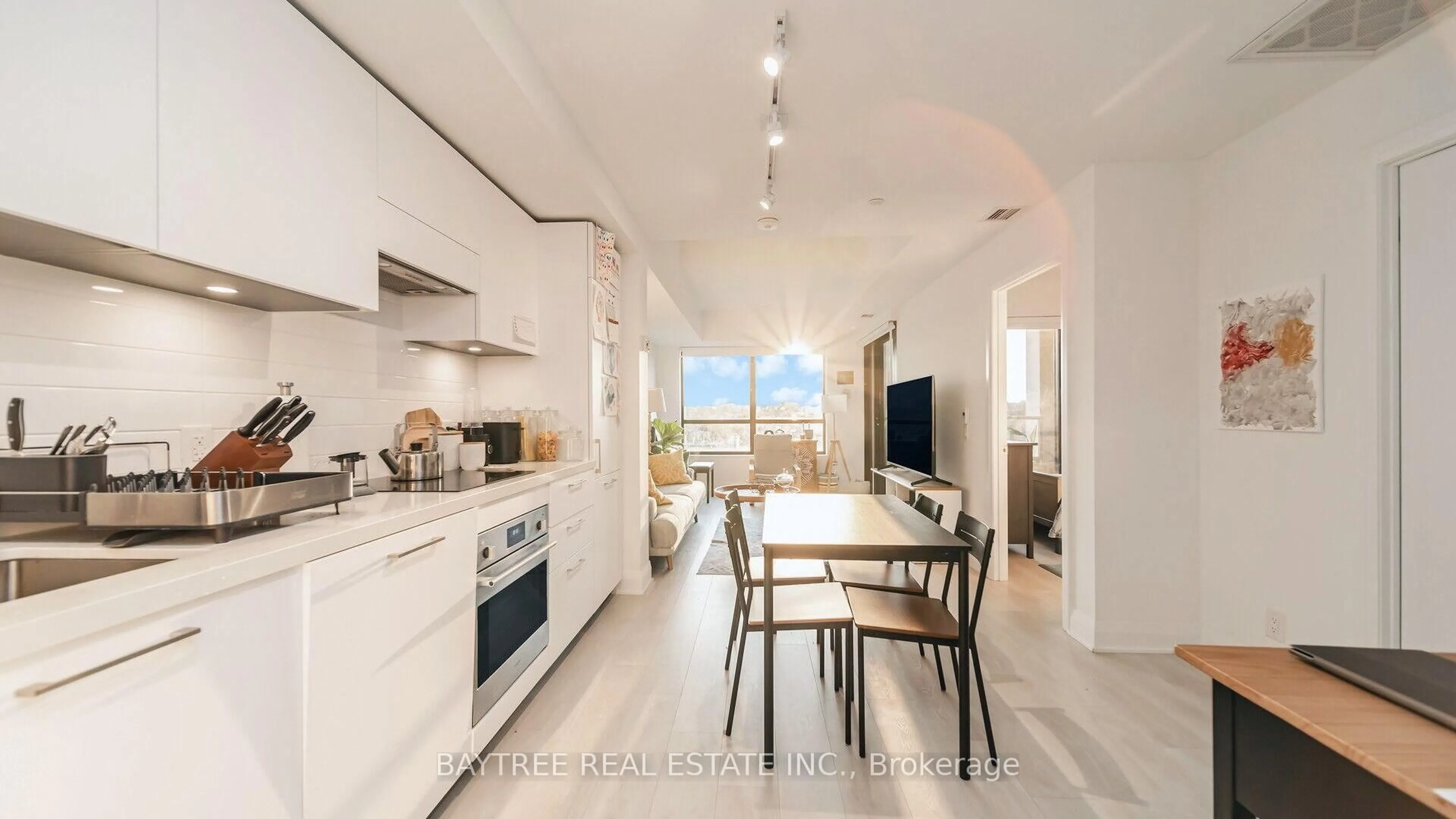 Open concept kitchen, ceramic/tile floor for 33 Frederick Todd Way #613, Toronto Ontario M4G 0C9