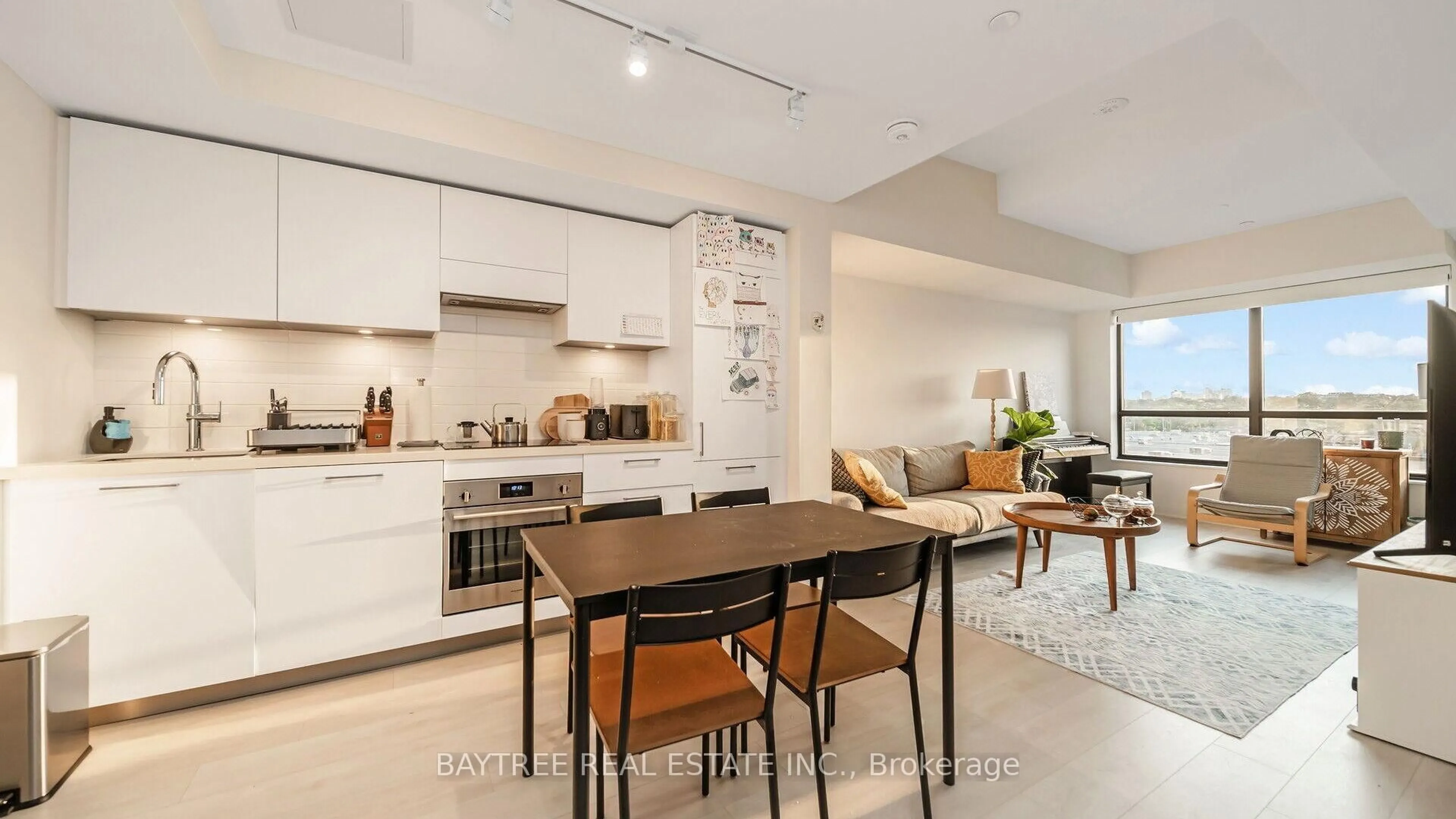 Open concept kitchen, ceramic/tile floor for 33 Frederick Todd Way #613, Toronto Ontario M4G 0C9