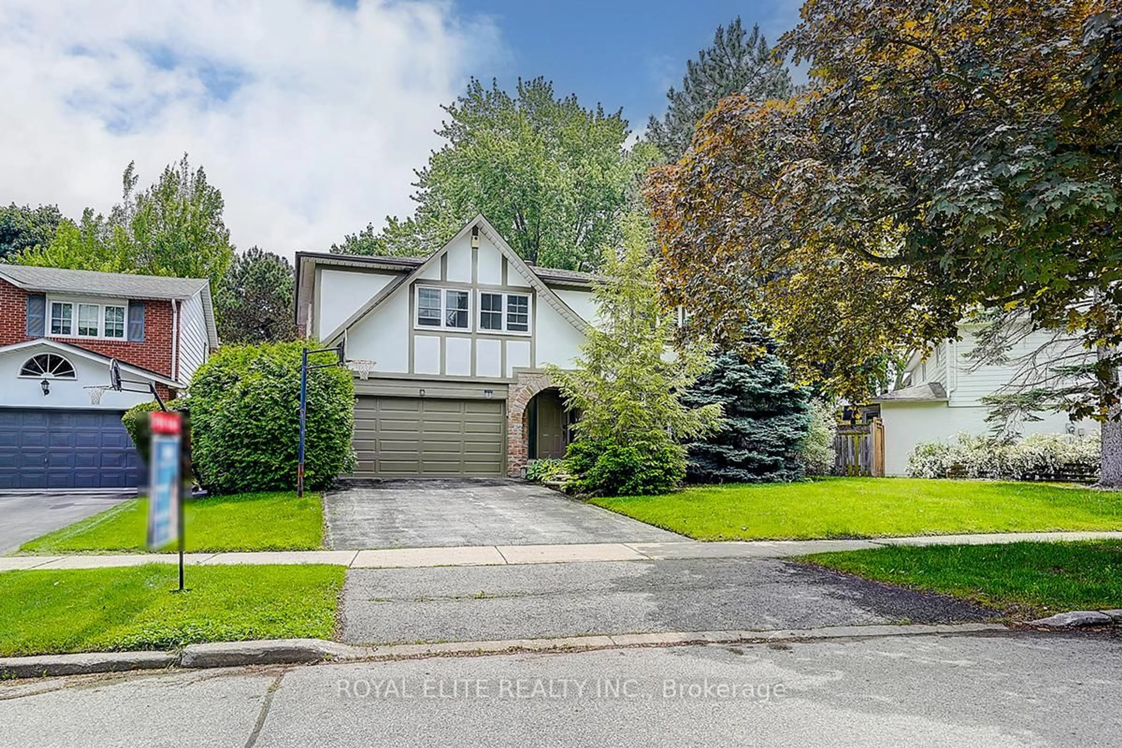 Home with vinyl exterior material, street for 11 Abbeywood Tr, Toronto Ontario M3B 3B4
