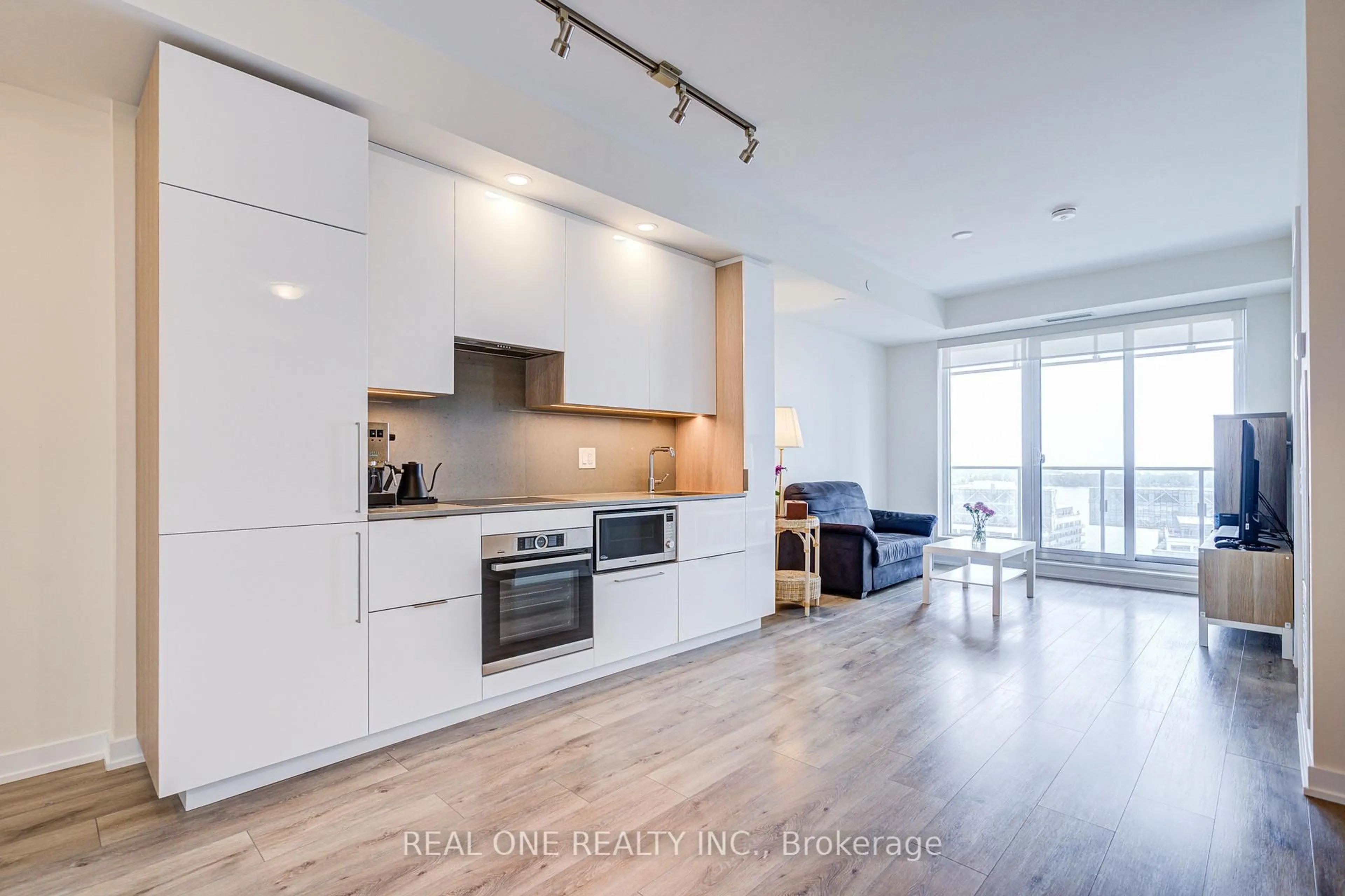 Open concept kitchen, wood/laminate floor for 28 Freeland St #1810, Toronto Ontario M5E 0E3