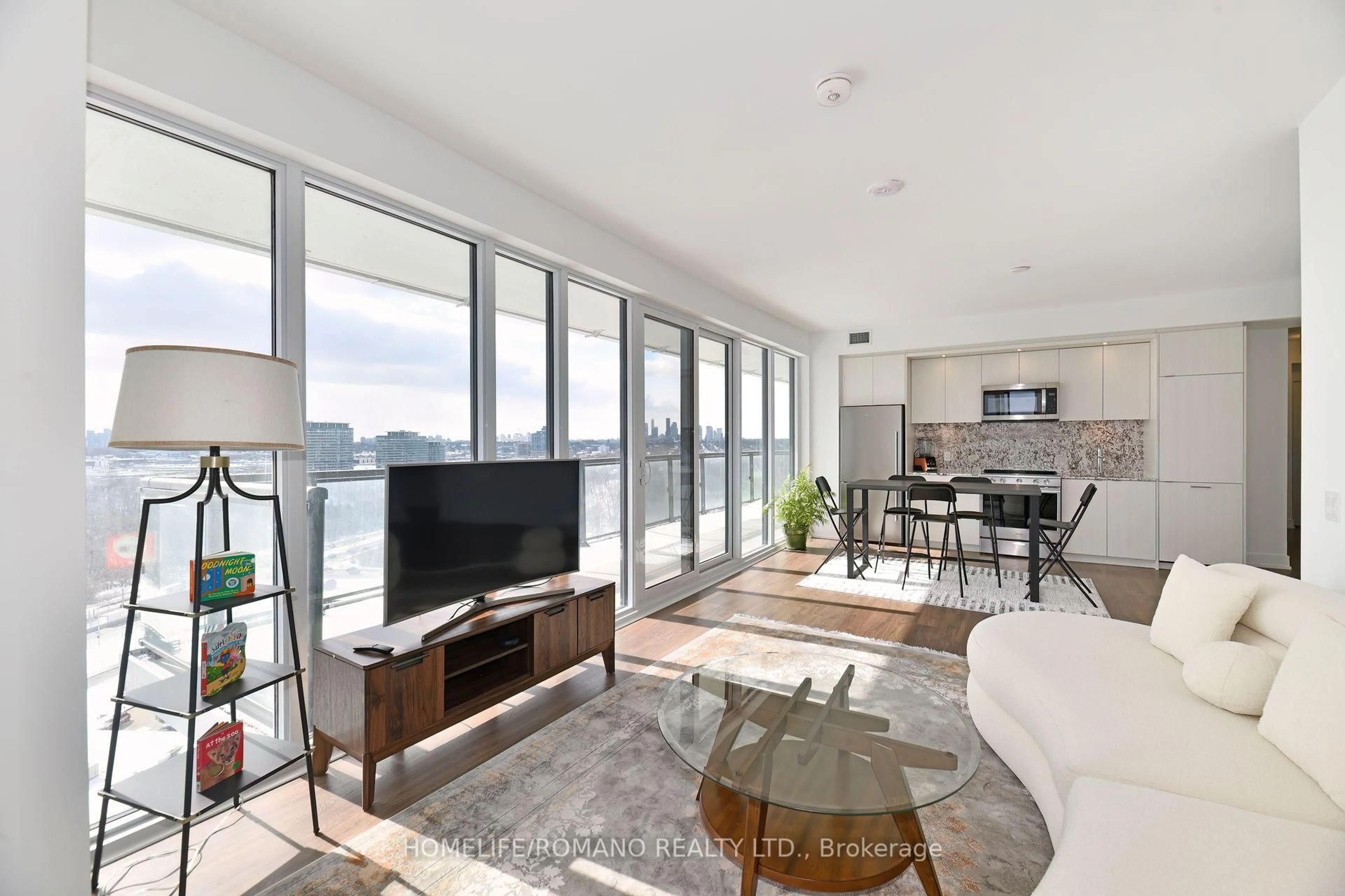 Living room with furniture, unknown for 30 Inn On The Park Dr #1409, Toronto Ontario M3C 0P7