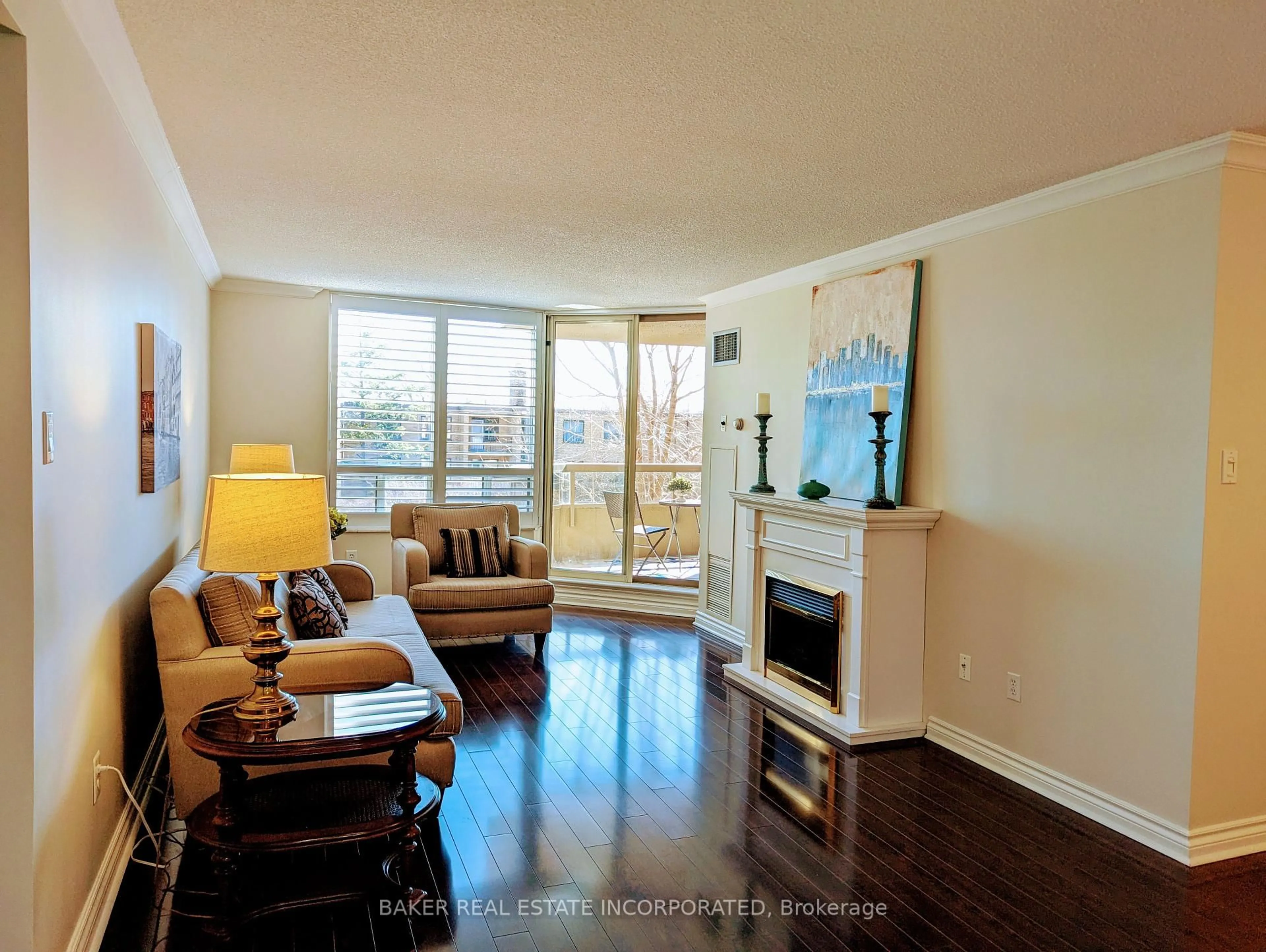 Living room with furniture, wood/laminate floor for 1200 Don Mills Rd #308, Toronto Ontario M3B 3N8