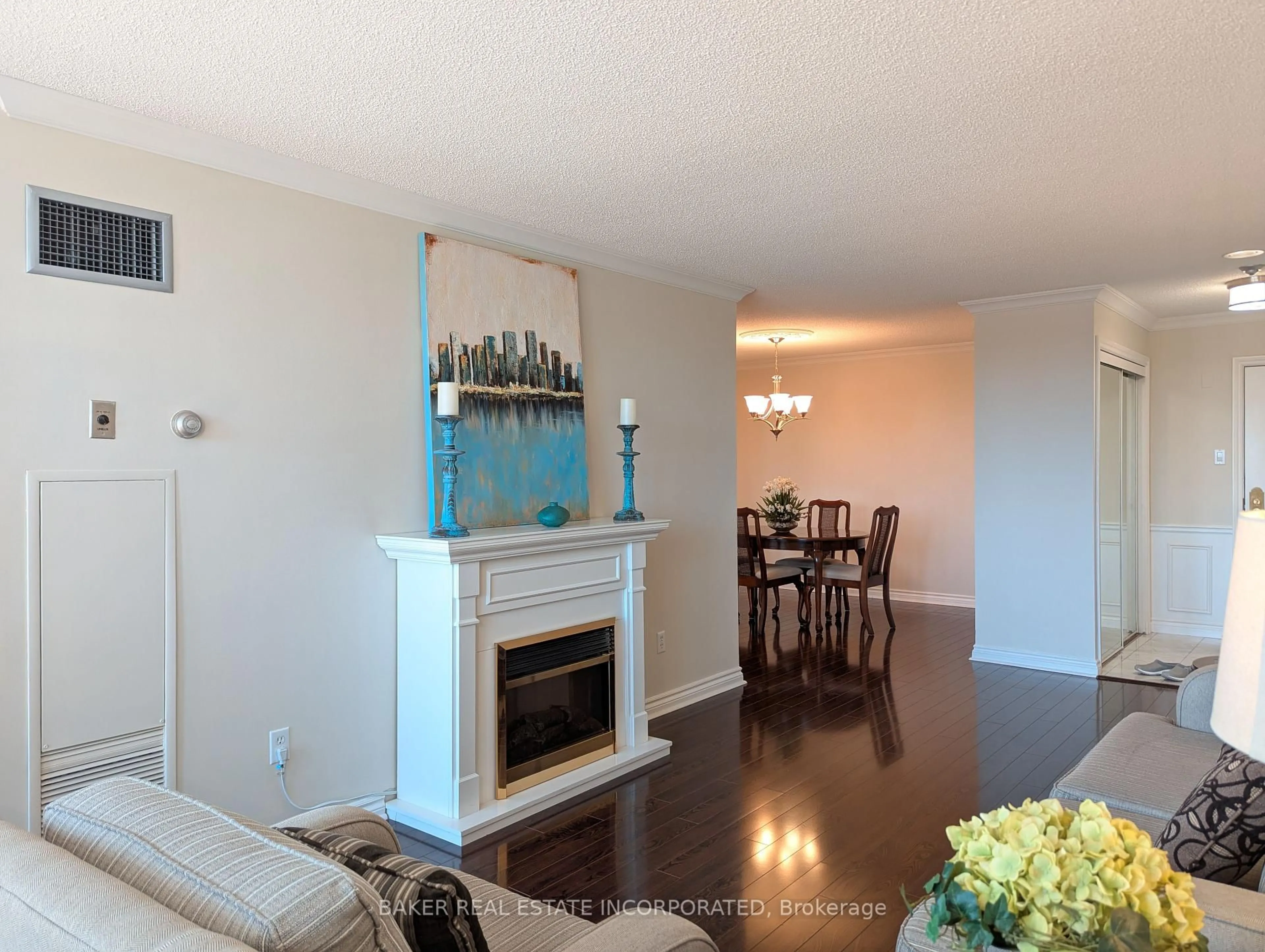 Living room with furniture, wood/laminate floor for 1200 Don Mills Rd #308, Toronto Ontario M3B 3N8