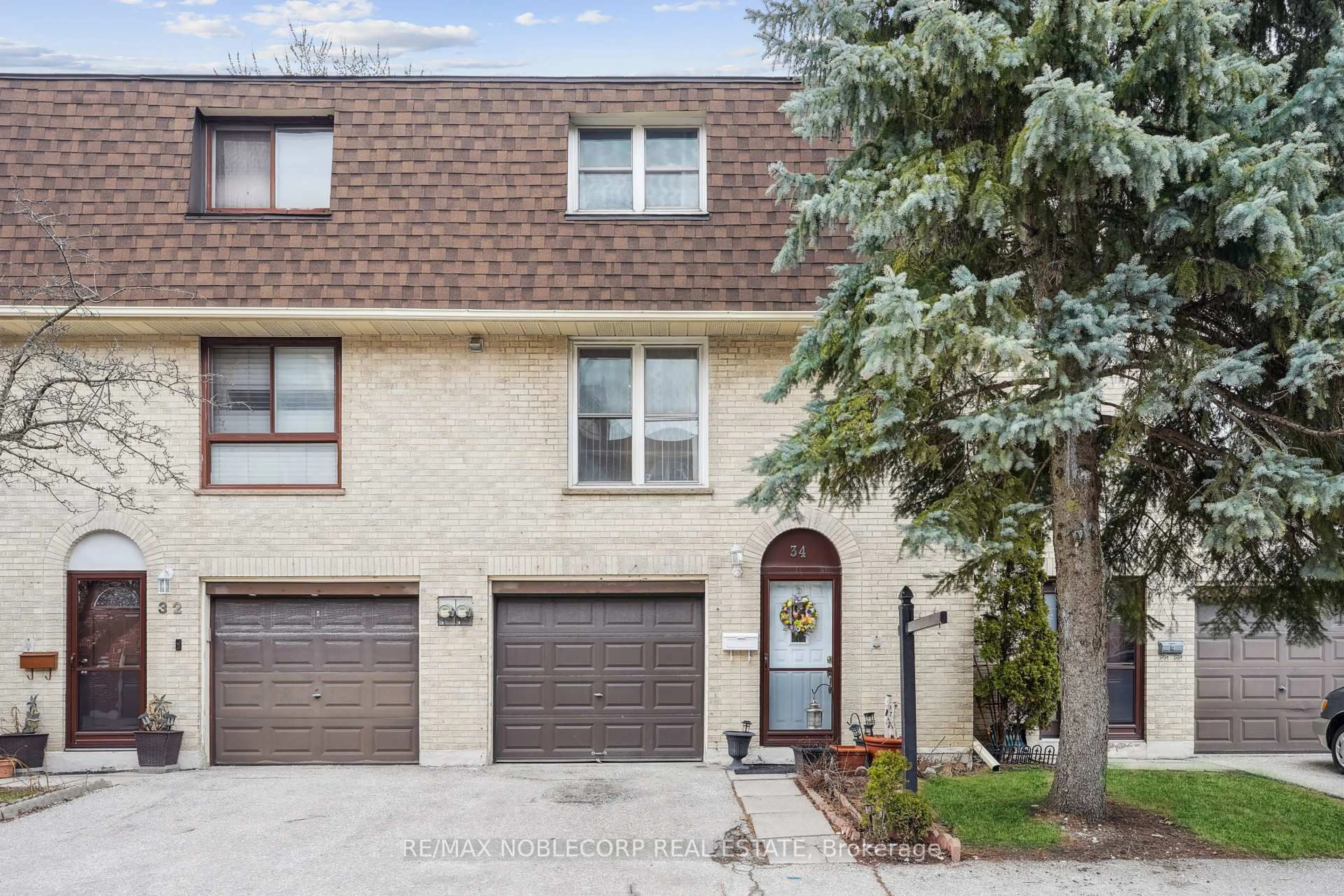 Home with brick exterior material, street for 34 Corvus Star Way, Toronto Ontario M2J 1P3
