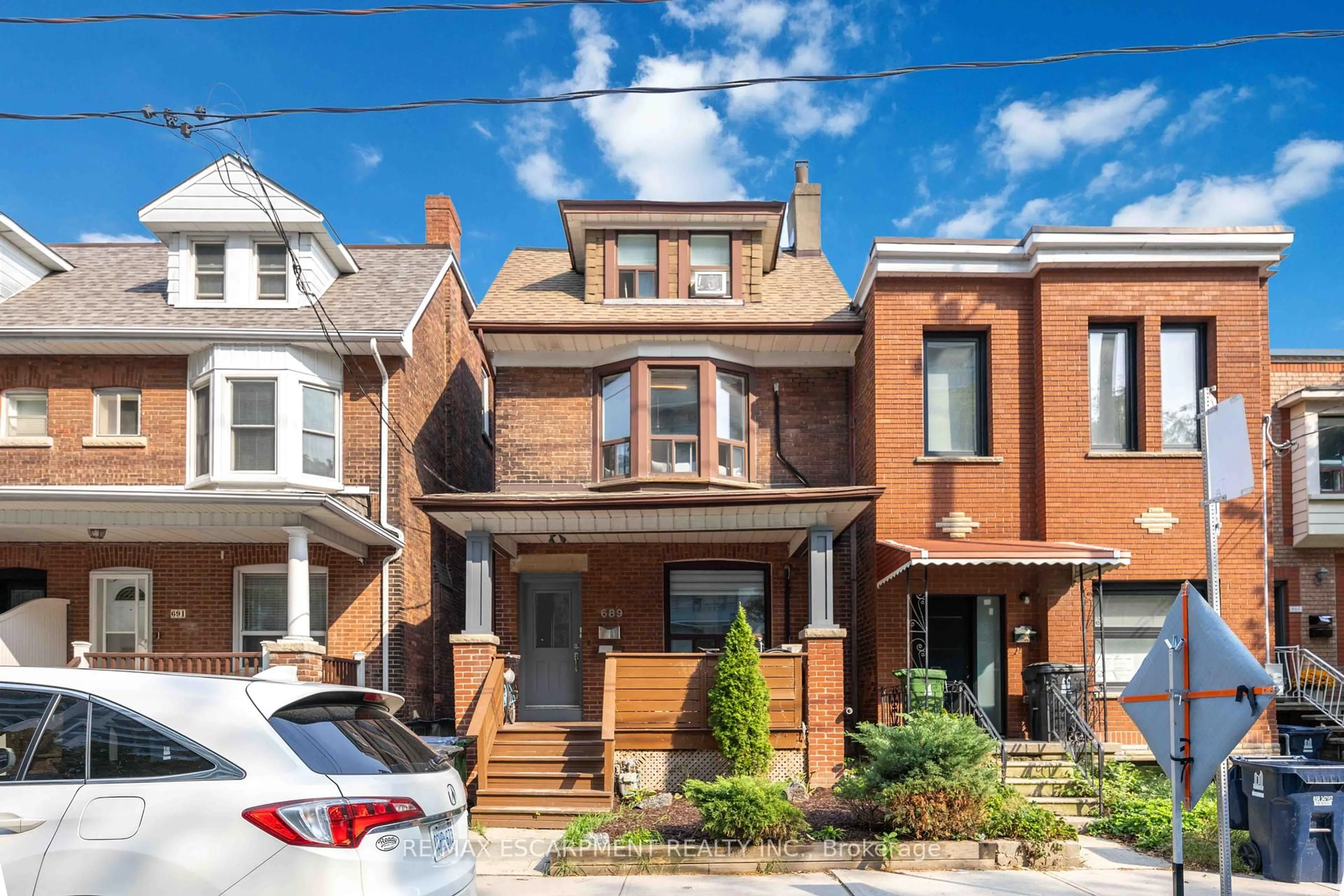 Home with brick exterior material, street for 689 Dovercourt Rd, Toronto Ontario M6H 2W7