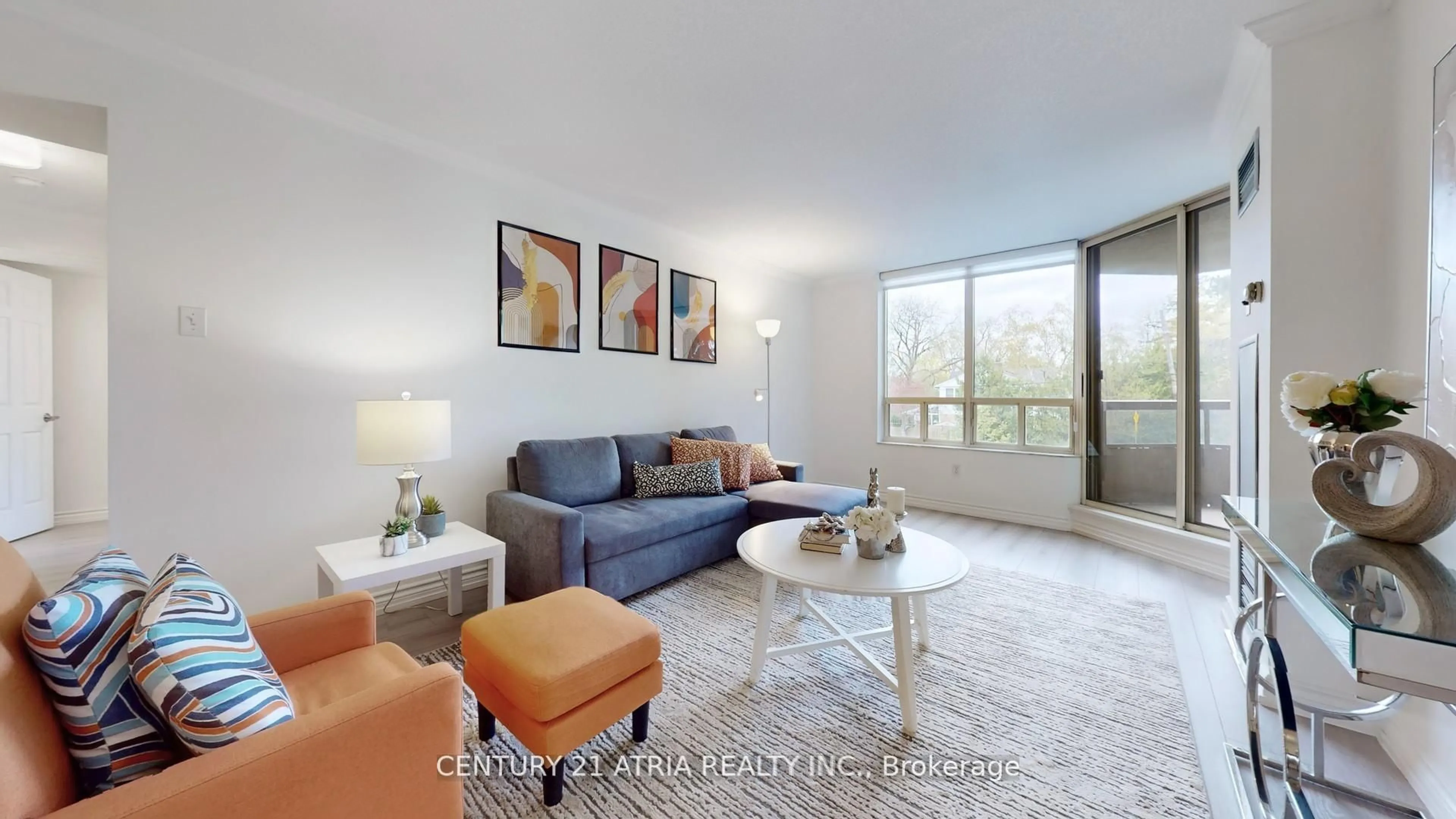 Living room with furniture, unknown for 1210 Don Mills Rd #202, Toronto Ontario M3B 3N9