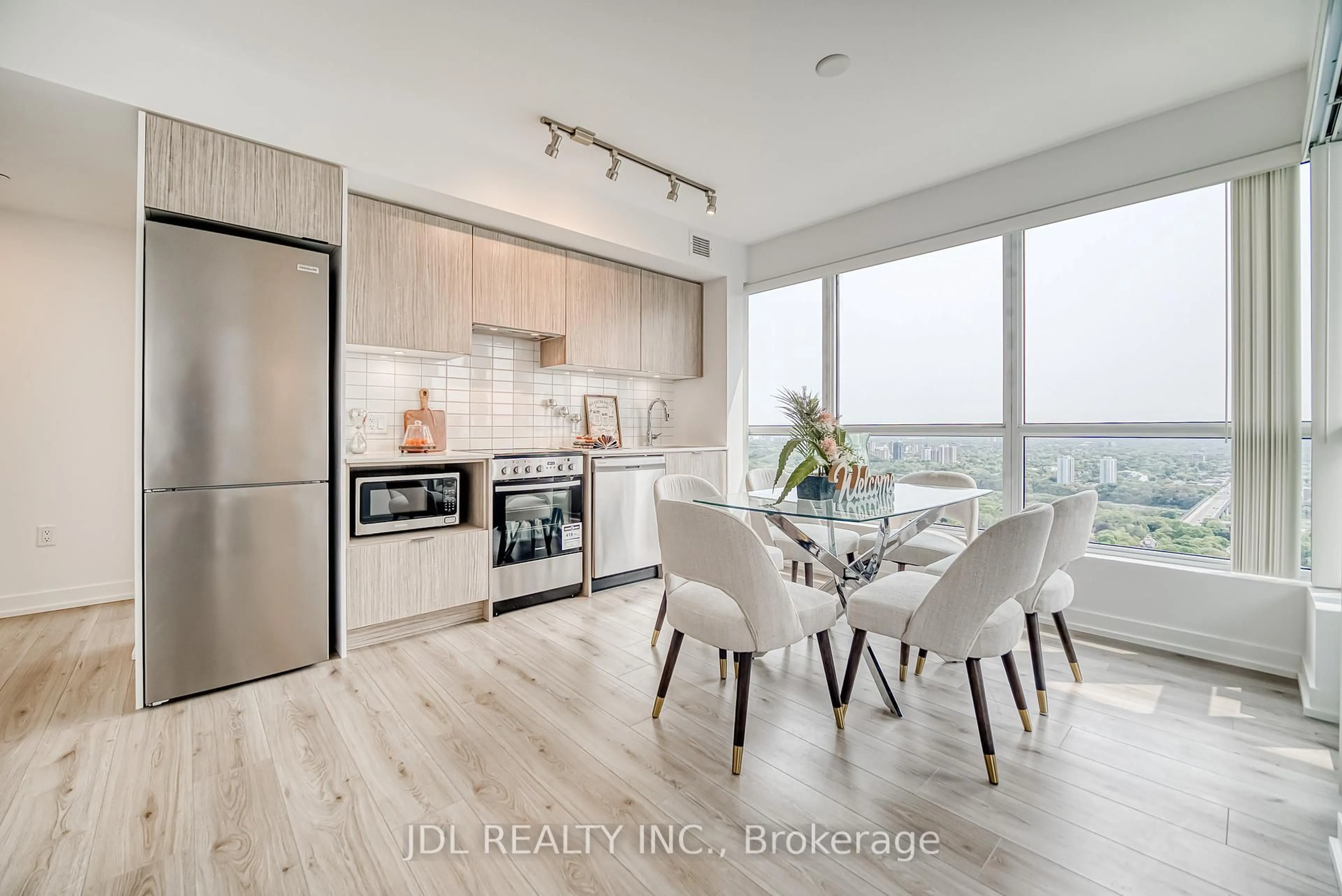 Open concept kitchen, wood/laminate floor for 395 Bloor St #3910, Toronto Ontario M4W 1H7