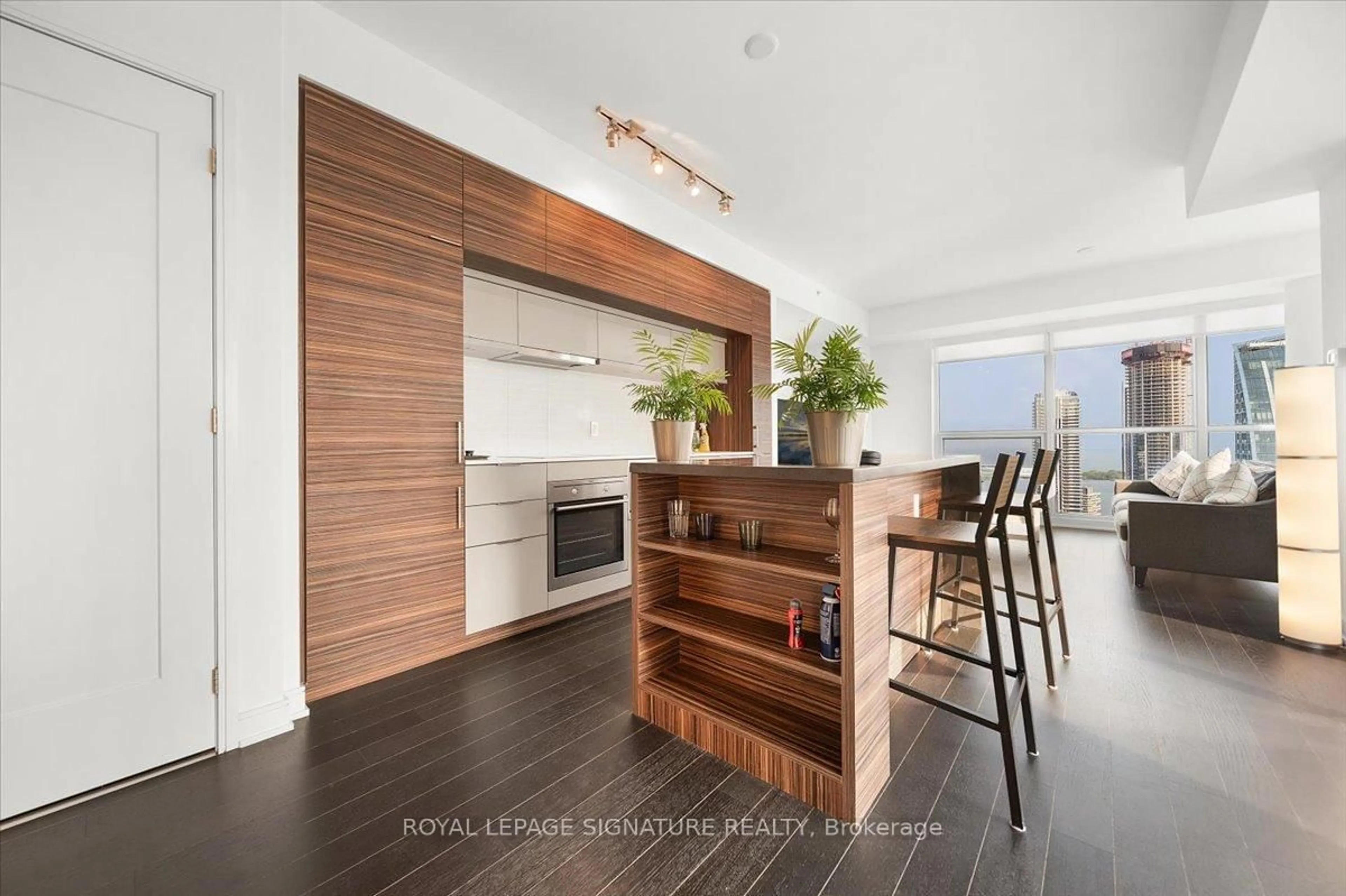 Contemporary kitchen, wood/laminate floor for 88 Scott St #5207, Toronto Ontario M5E 0A9