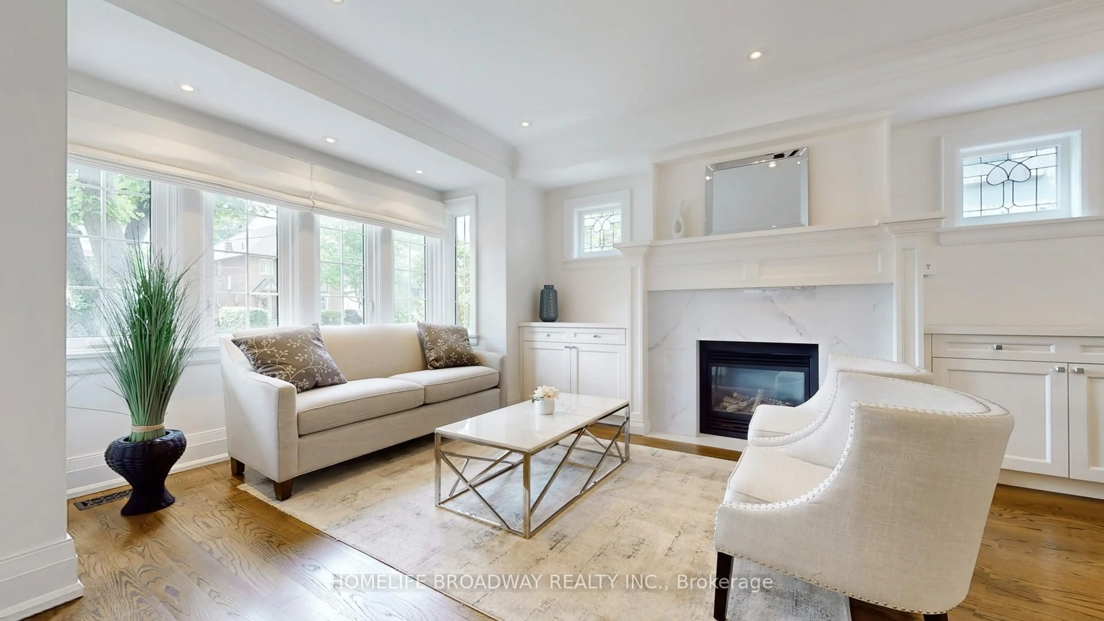 Living room with furniture, wood/laminate floor for 30 Kilbarry Rd, Toronto Ontario M5P 1K5