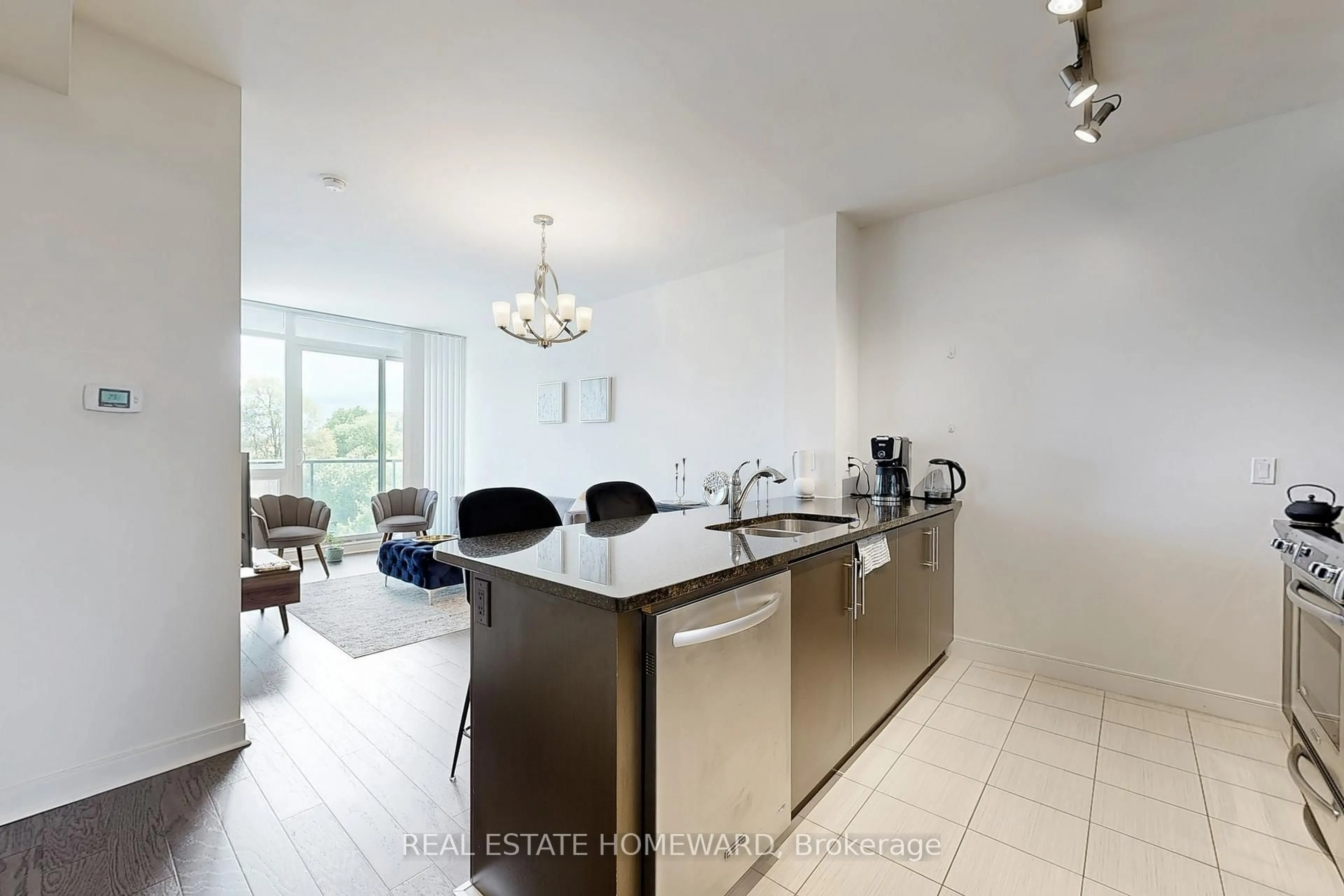 Open concept kitchen, unknown for 825 Church St #506, Toronto Ontario M4W 3Z4