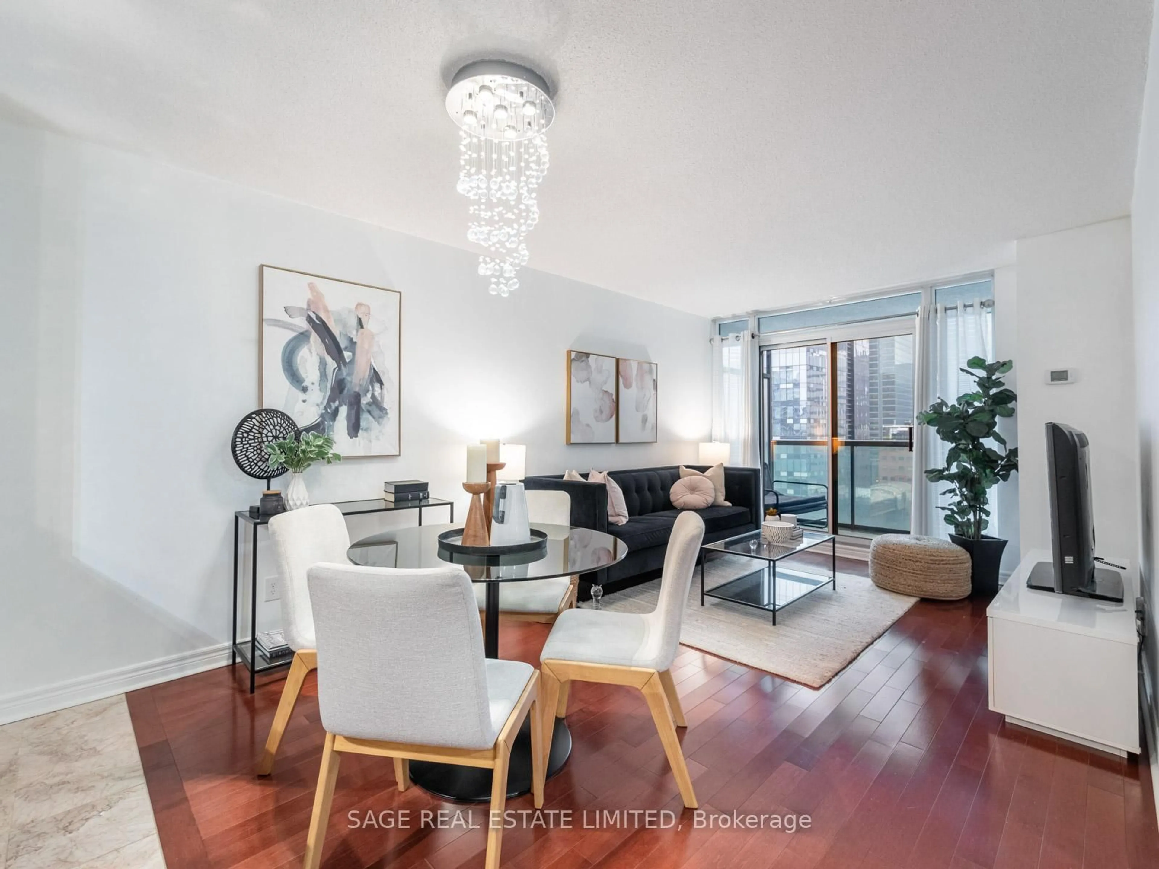 Living room with furniture, wood/laminate floor for 30 Grand Trunk Cres #1705, Toronto Ontario M5J 3A4
